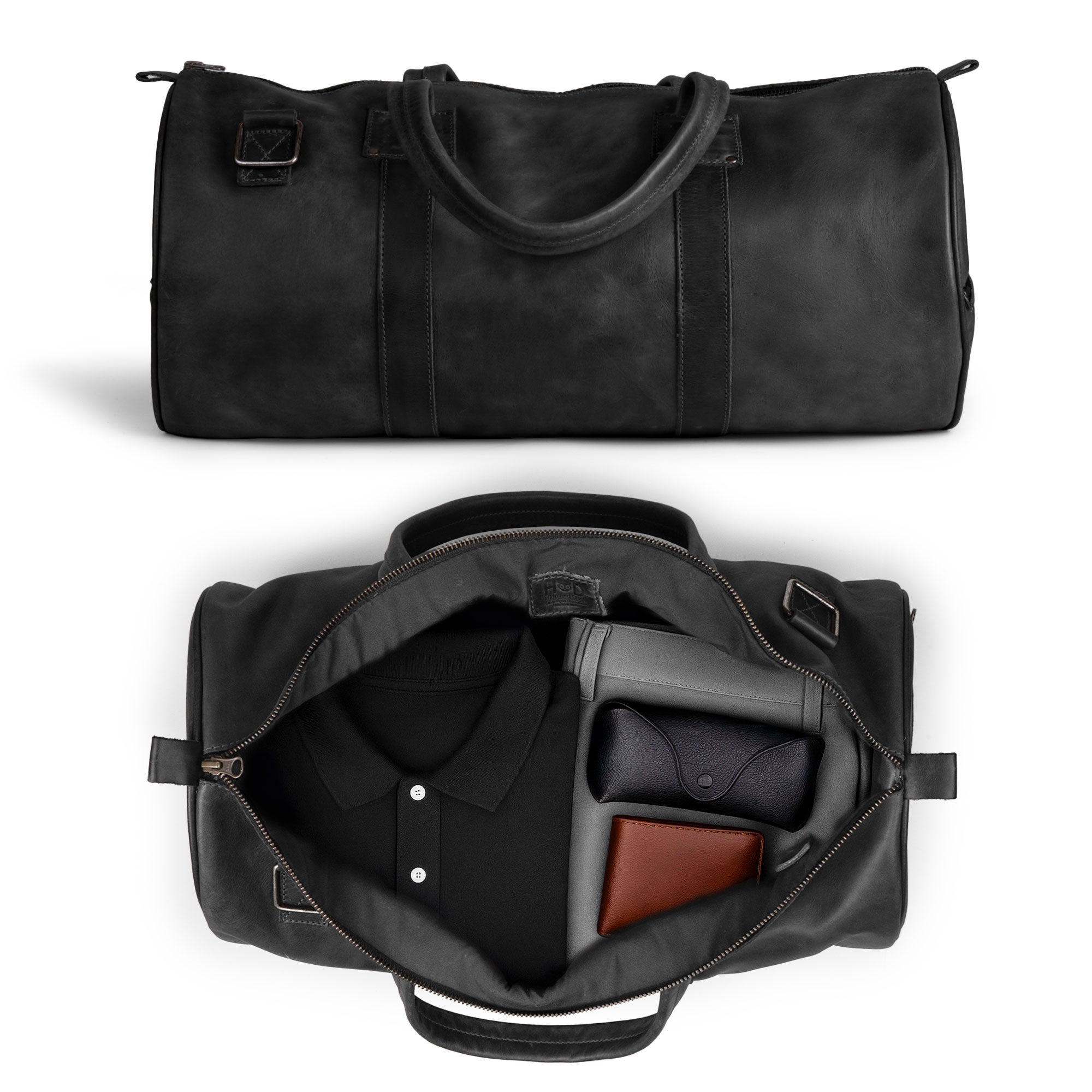 Close-up view of the Classic Duffle Bag by Hide & Drink in tan leather, emphasizing details of zipper closure and craftsmanship. This Full Grain Leather Classic Duffle Bag is designed as a classic Messenger Bag for all your travels, handmade in La Antigua Guatemala & Oaxaca Mexico.