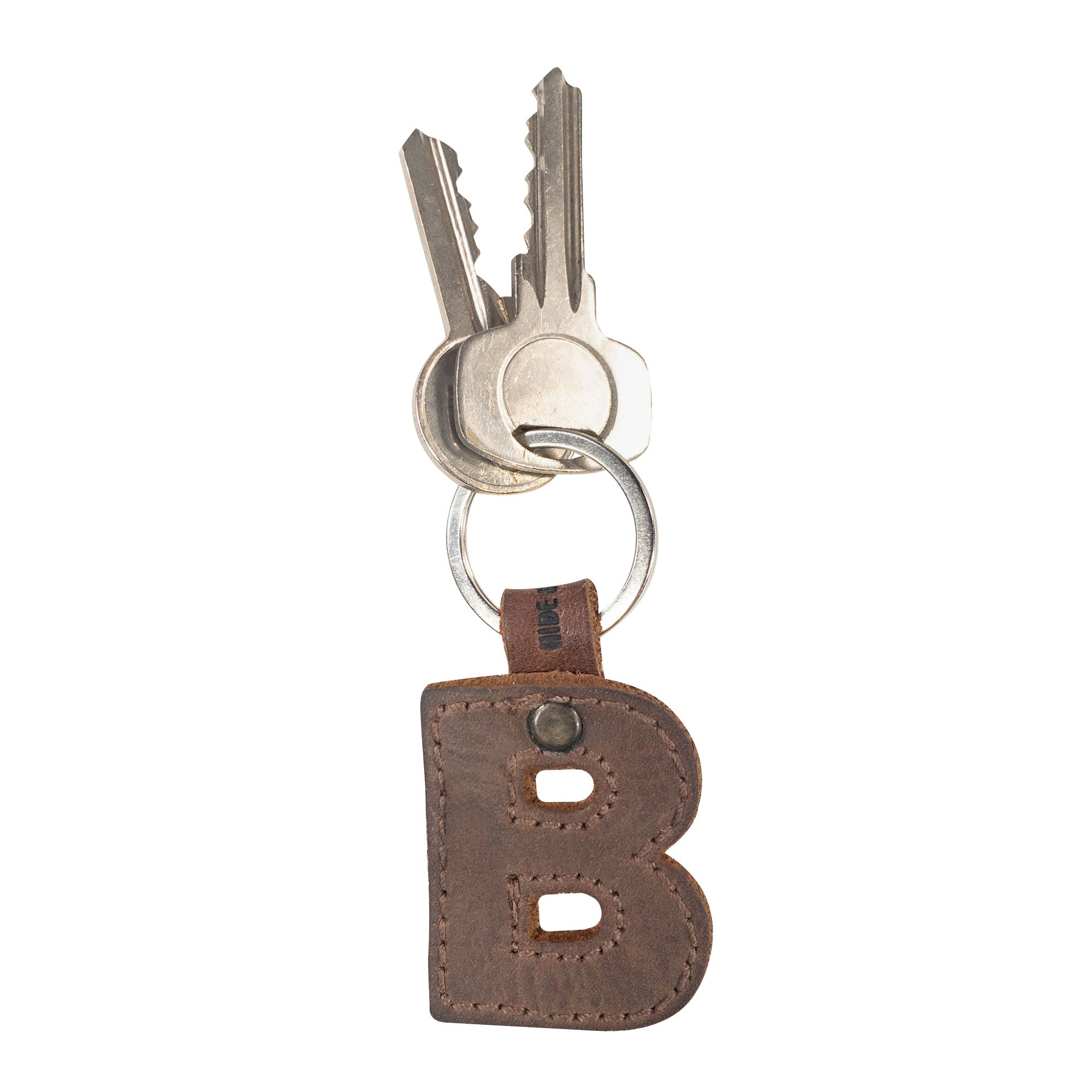 Charming 'B' thick leather Alphabet Letter Keychain by Hide & Drink, perfect for a personalized gift. This full grain leather keychain reflects artisan workmanship from La Antigua Guatemala.