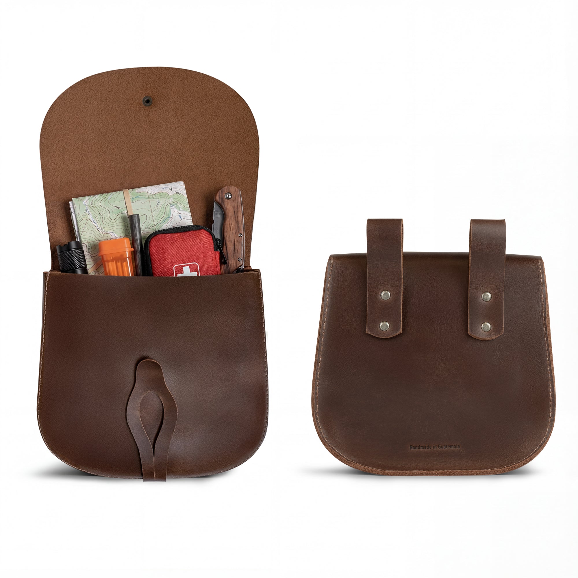 Inside view of The Forester, Waist Bag by Valhalla Gear, showcasing its spacious design for holding maps and tools. This Leather Tool Organizer Belt Pouch is a versatile Medieval Style Waist Bag for Outdoors, tailored for easy accessibility. With vintage belt loops, it's suited for both men and women. Made from full grain leather, this artisan product features careful hand crafting in La Antigua Guatemala & Oaxaca Mexico.