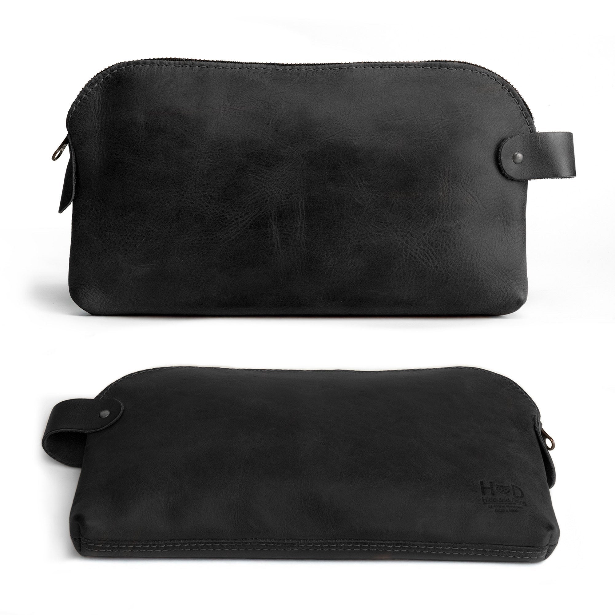 Dopp Kit Utility Bag by Hide & Drink displaying its attractive design and robust build quality. This large rustic all-purpose Dopp Kit Utility Bag is ideal for organizing travel necessities and is made from full grain leather, featuring artisan hand cut and hand sewn techniques, handmade in La Antigua Guatemala & Oaxaca Mexico.
