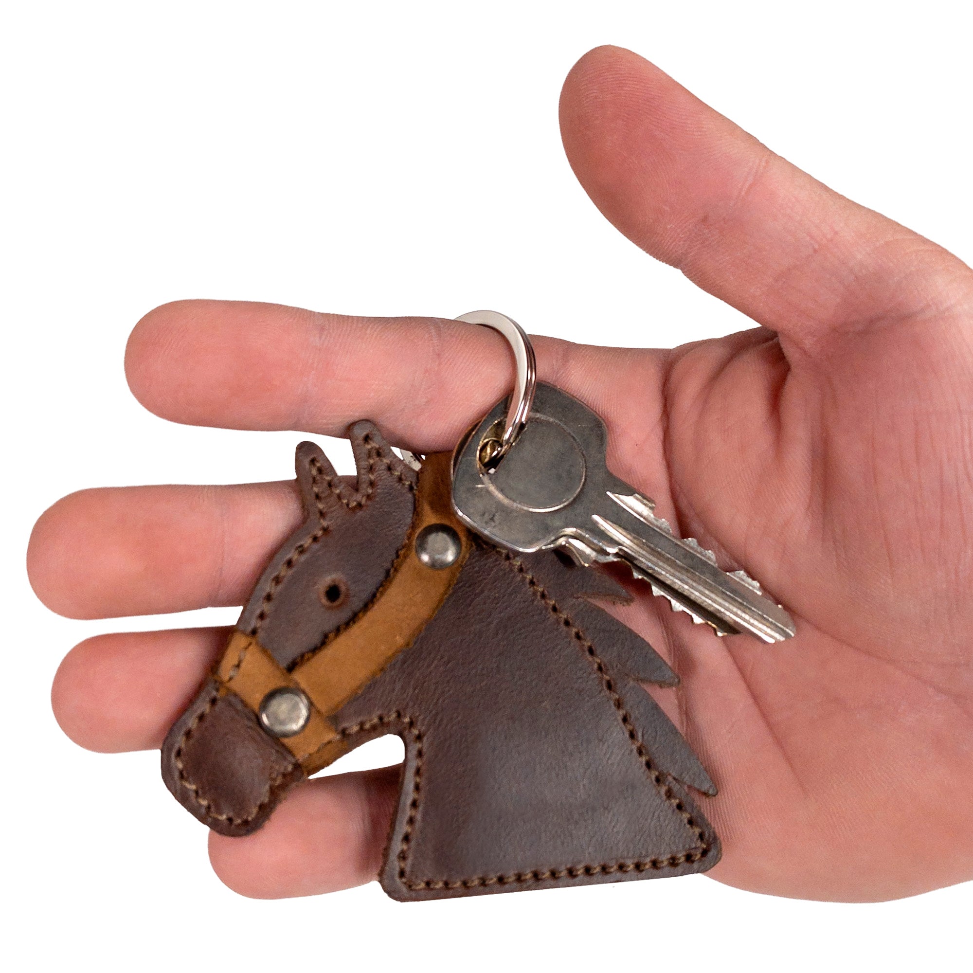 Handcrafted Horse Head Keychain from Hide & Drink, designed for stylish key organization. This full grain leather accessory makes a great gag gift for cowboys and cowgirls, showcasing artisan quality in small batch production from Oaxaca, Mexico.