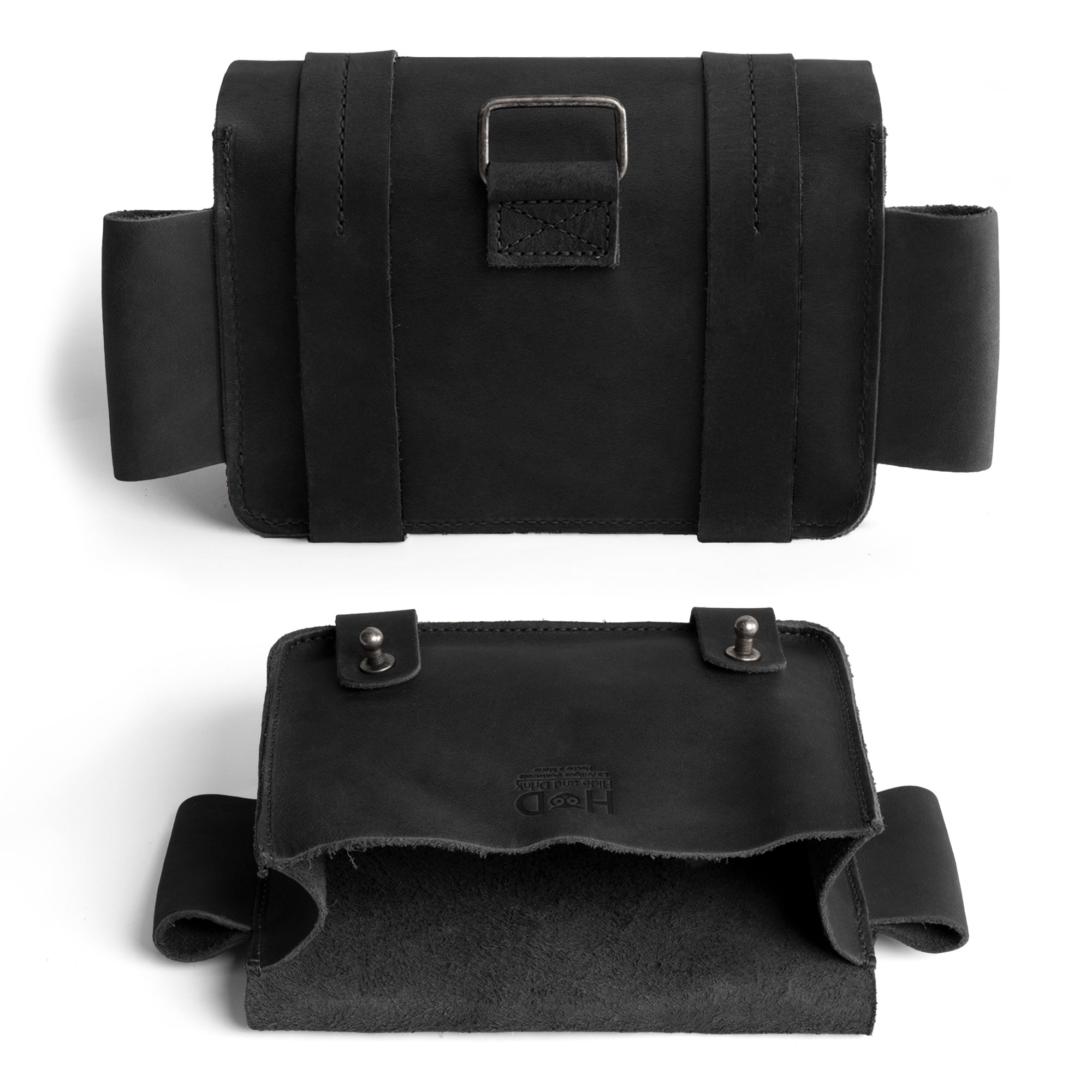 The back view of Hide & Drink's black Empty First Aid Bag, Mini Medical Storage Pouch, highlighting its sleek and functional design. This Empty First Aid Bag is a compact container for medical kits, showcasing hand sewn craftsmanship and artisan quality from small batch production in La Antigua Guatemala.