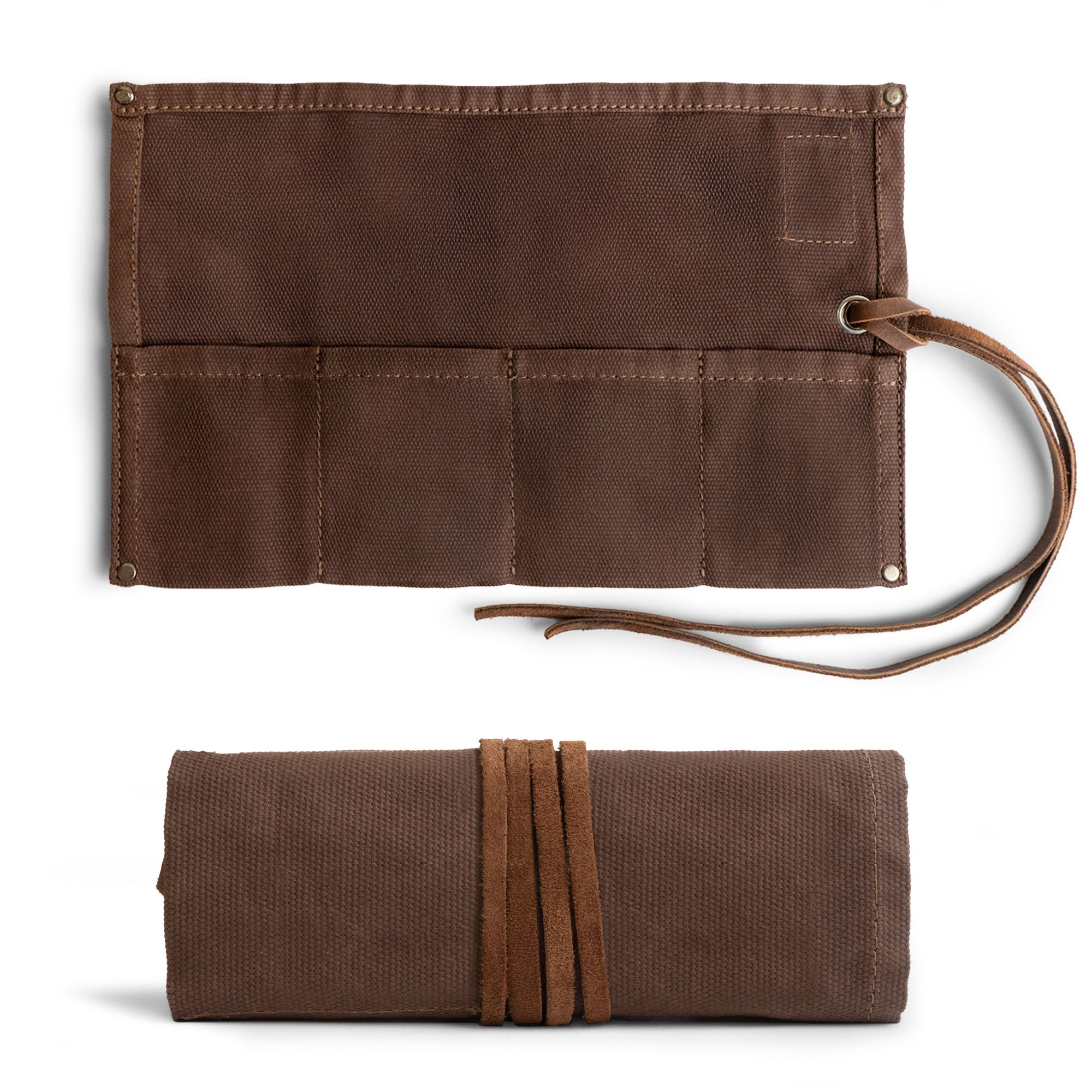The backside of the Waxed Canvas Watch Roll from Hide & Drink, designed to hold up to 4 watches. This handmade storage combines rustic aesthetics with practicality, crafted in small batches.