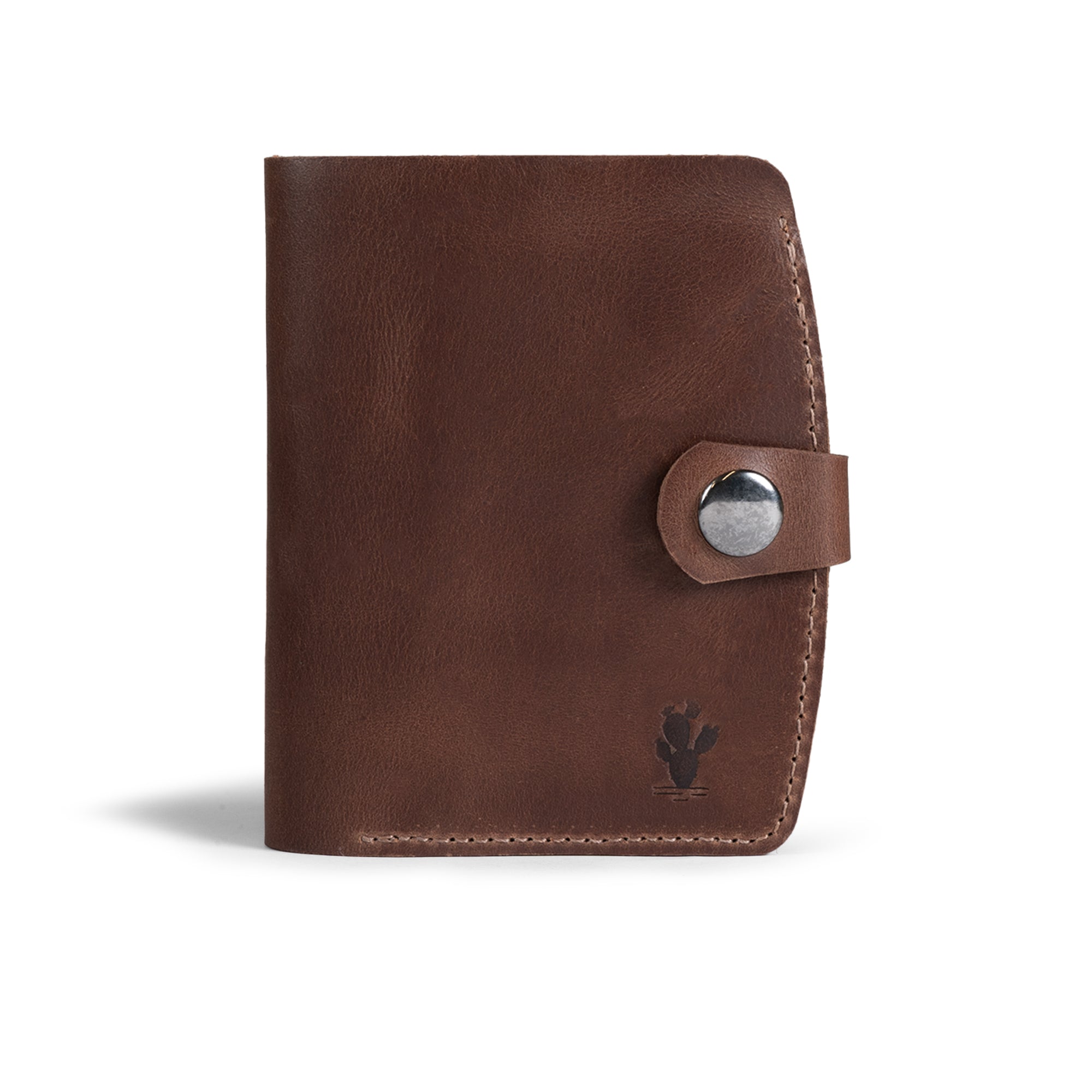 Closed Austin Genuine The Waterloo Bifold Wallet in rich brown Full Grain Leather with a secure snap strap and handcrafted stitched edges. StockyardX, Small Batch Production, Hand Cut, Hand Sewn, Fire Branded, Artisan, Handmade in La Antigua Guatemala & Oaxaca Mexico.