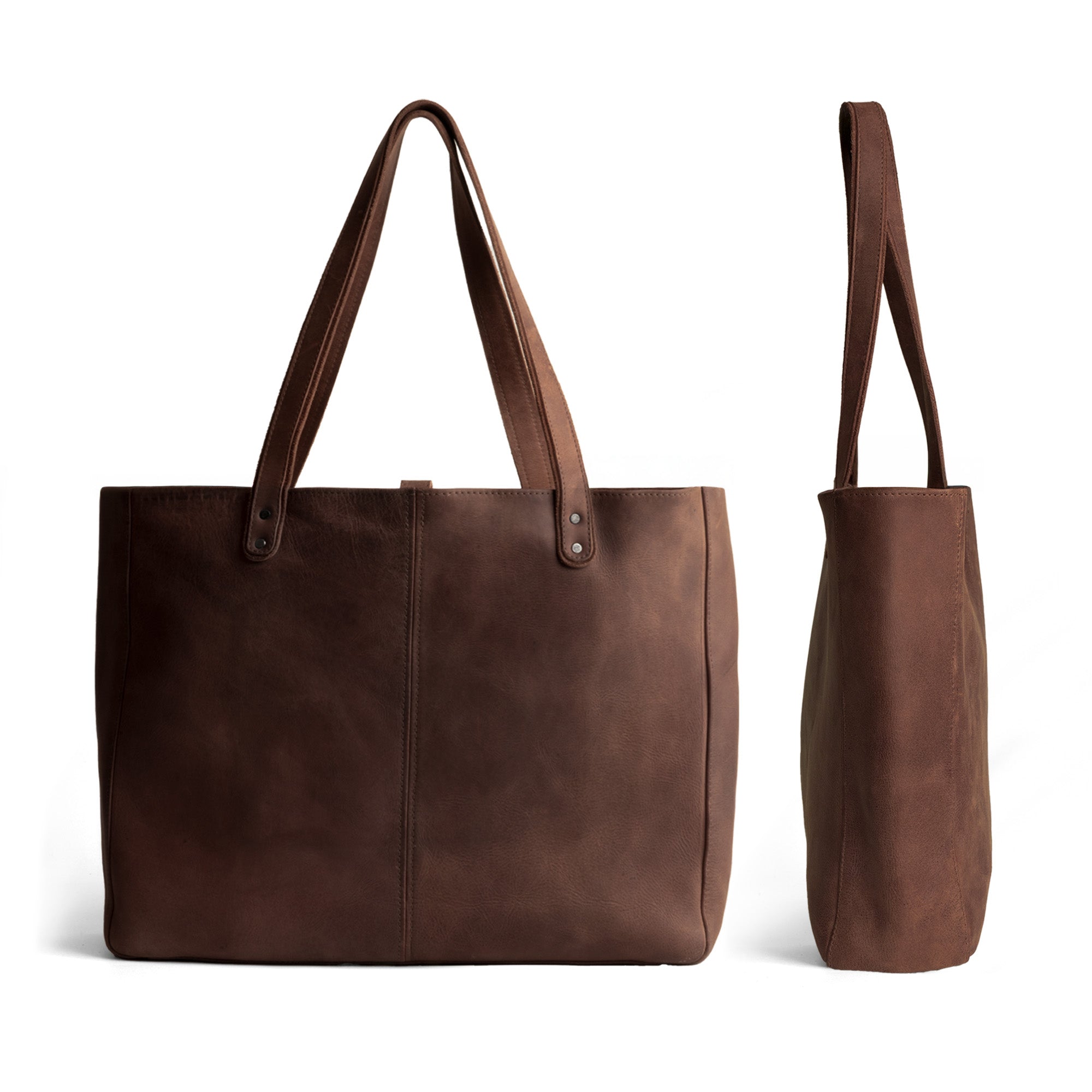 Elegant brown Formal Tote Bag for women from Hide & Drink, showcasing a sleek design as a large shoulder bag for work. This soft purse handbag is crafted from full grain leather, ensuring durability and style, suitable for both business and casual use. A remarkable choice for those who appreciate artisan craftsmanship in their everyday accessories.