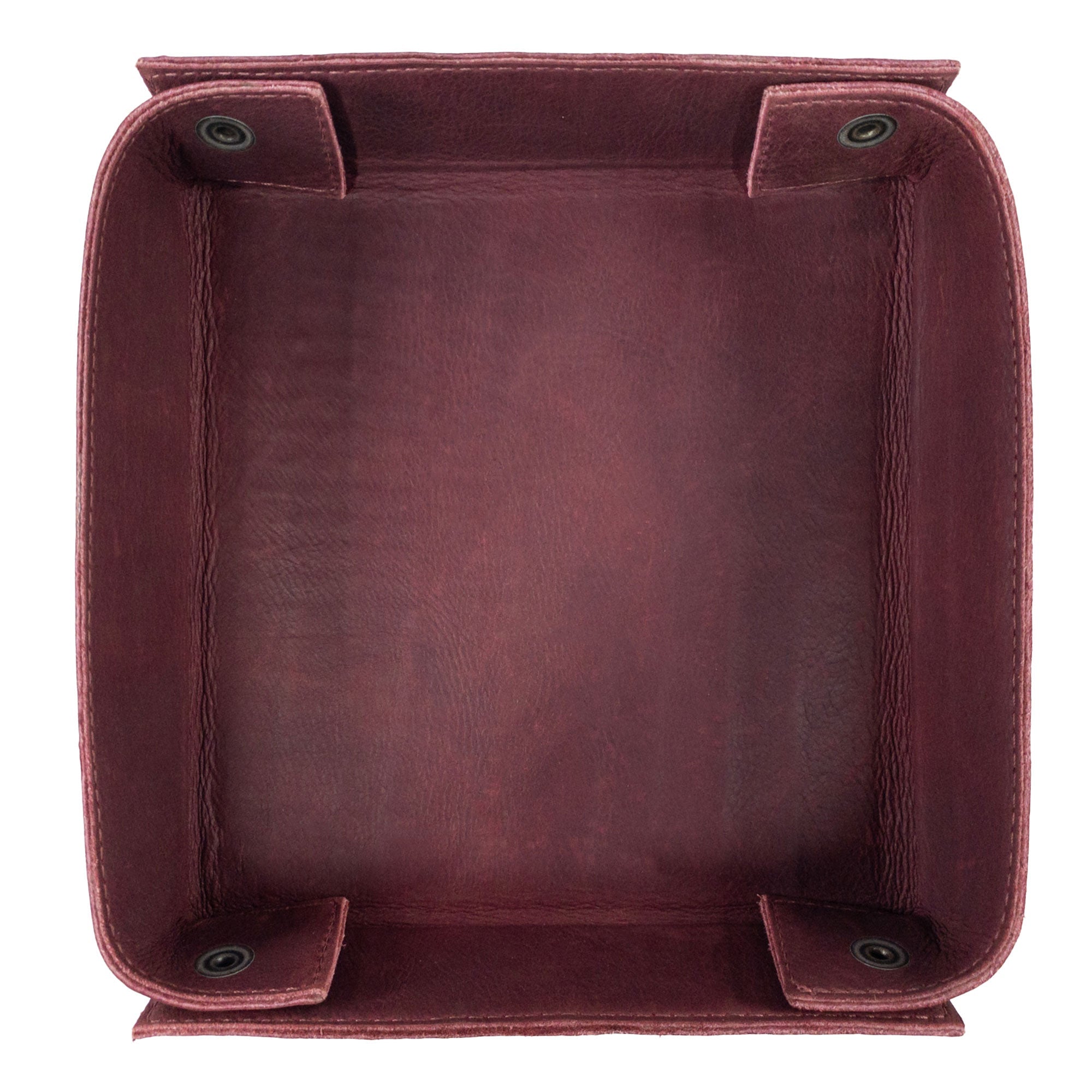 Hide & Drink Jumbo Tray, a versatile catchall tray crafted from full grain leather for organizing small items like smartphones and coins. Handmade by artisans in La Antigua Guatemala, this product emphasizes quality craftsmanship.