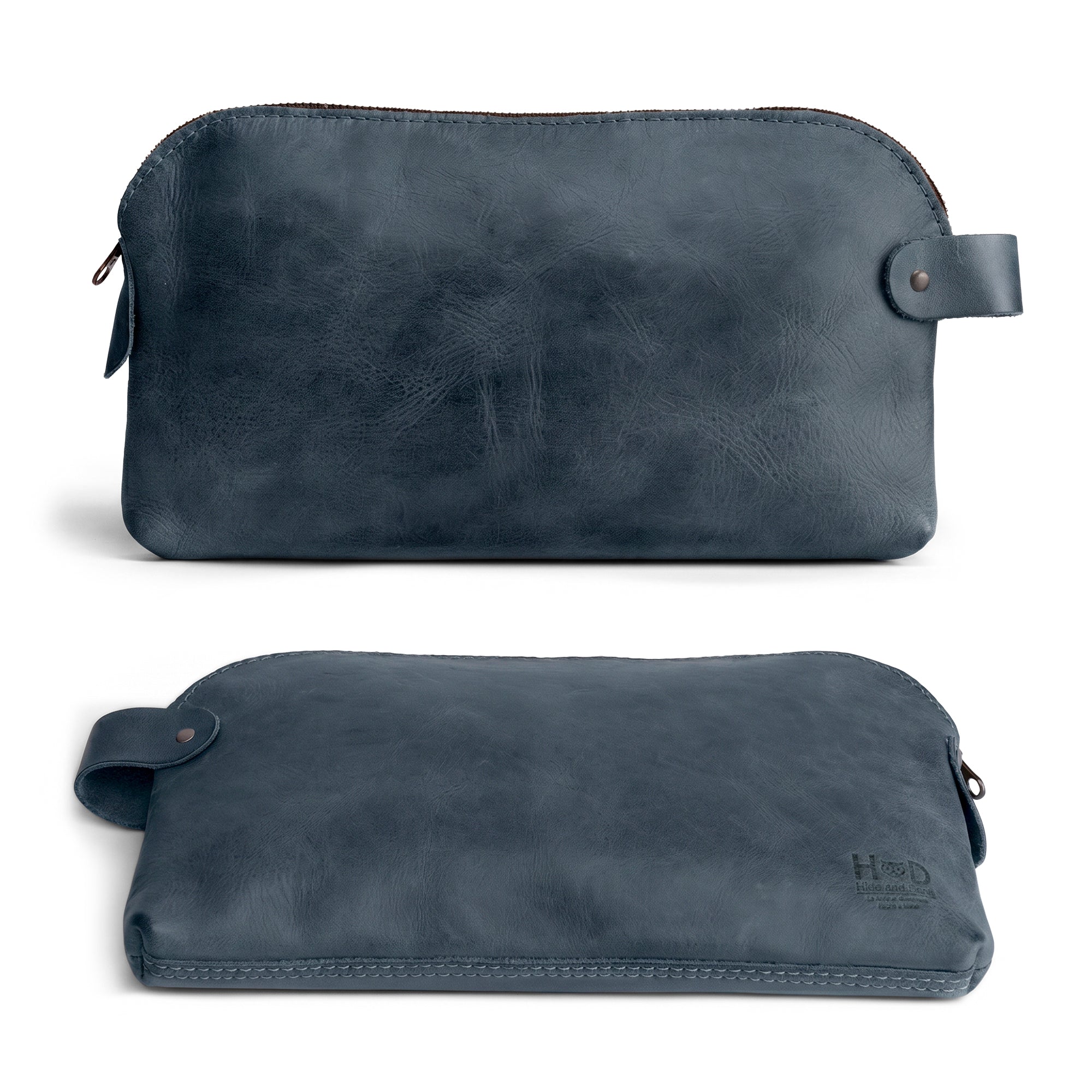 Dopp Kit Utility Bag by Hide & Drink presenting a showcasing of utility and style in its design. This artisan Dopp Kit Utility Bag is ideally suited for travel and crafted from full grain leather using small batch production, hand cut and hand sewn for durability, handmade in La Antigua Guatemala & Oaxaca Mexico.