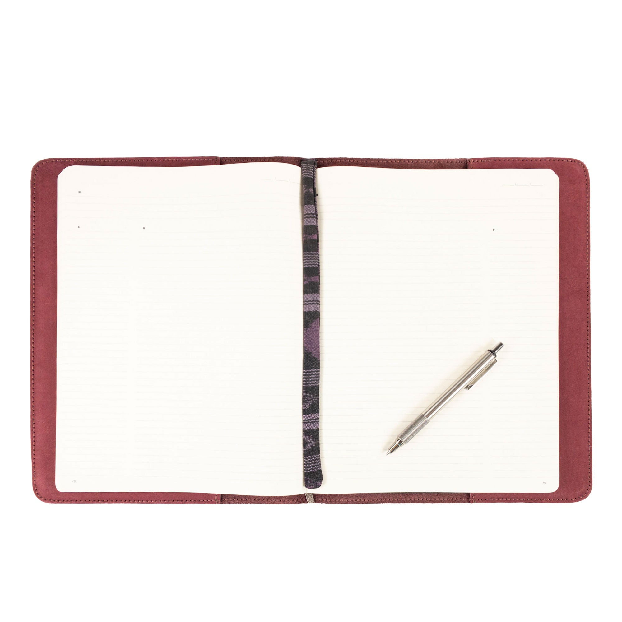The Journal Cover for (8.5 x 11 in.) Moleskine Cahier XXL by Hide & Drink, displayed open to highlight its elegant artisan design. This full grain leather protector is a perfect fit for any notebook lover, crafted in La Antigua Guatemala & Oaxaca Mexico.