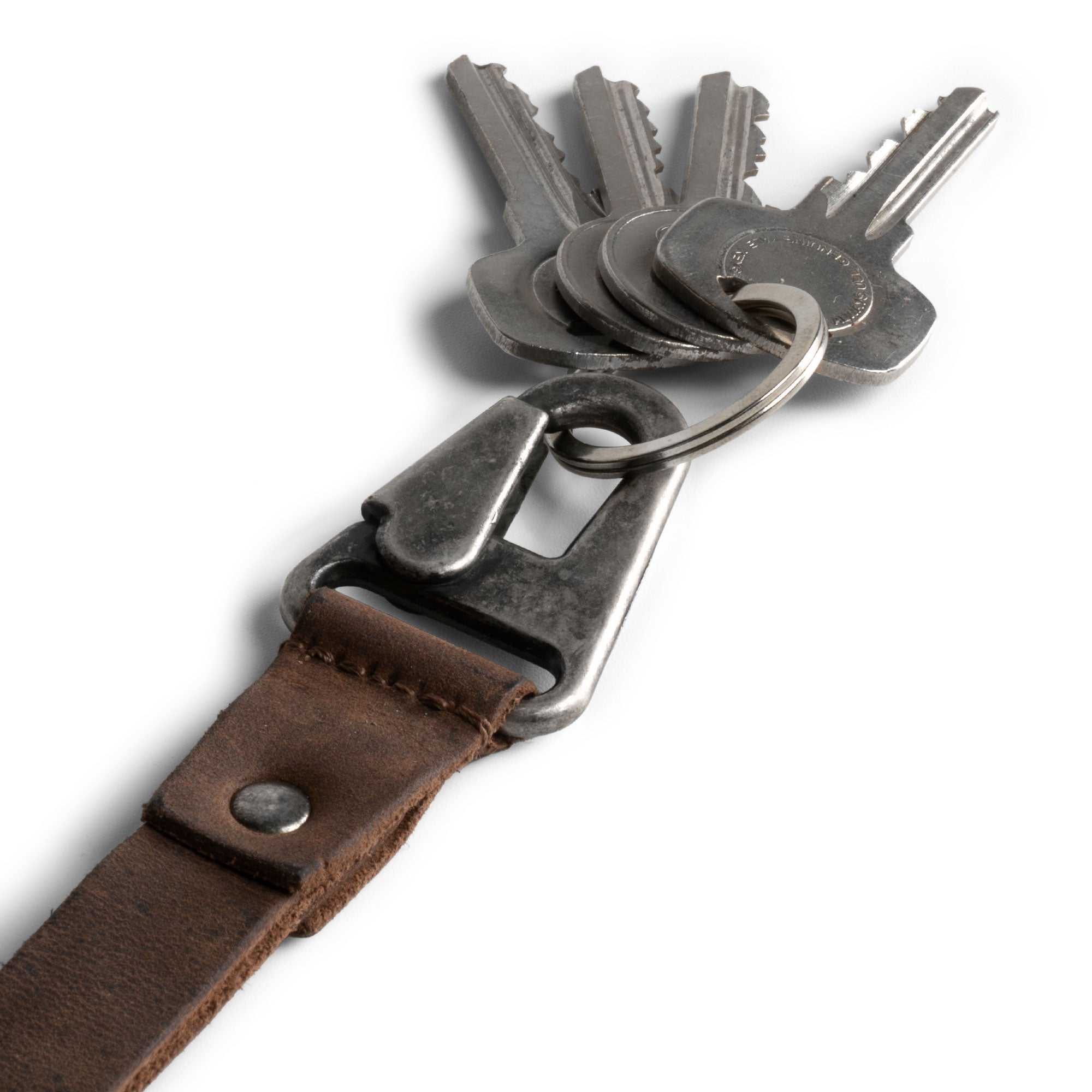 Elegant Lanyard Keychain by Hide & Drink, made from full grain leather and featuring a secure hook, ideal for ID holders. This handmade accessory, perfect for both men and women, epitomizes artisan craftsmanship in La Antigua Guatemala & Oaxaca Mexico.