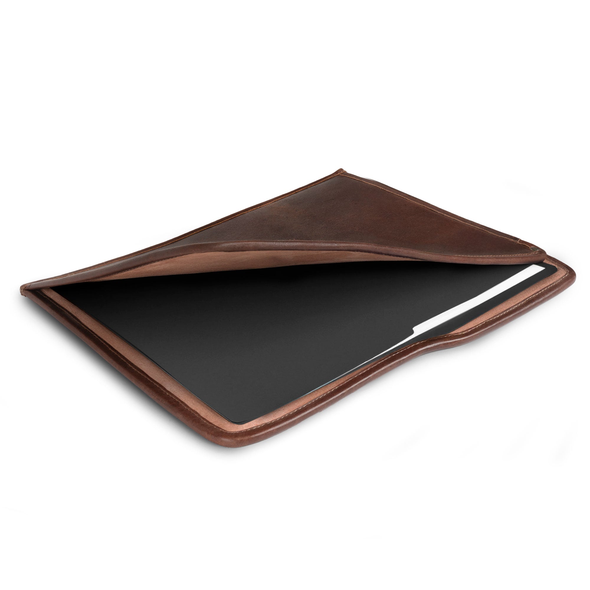 Side view of the Manila Folder by Hide & Drink, highlighting its functionality as a Document Holder. This sturdy Full Grain Leather piece reflects the principles of Small Batch Production and the quality craftsmanship from artisans in La Antigua Guatemala and Oaxaca Mexico.