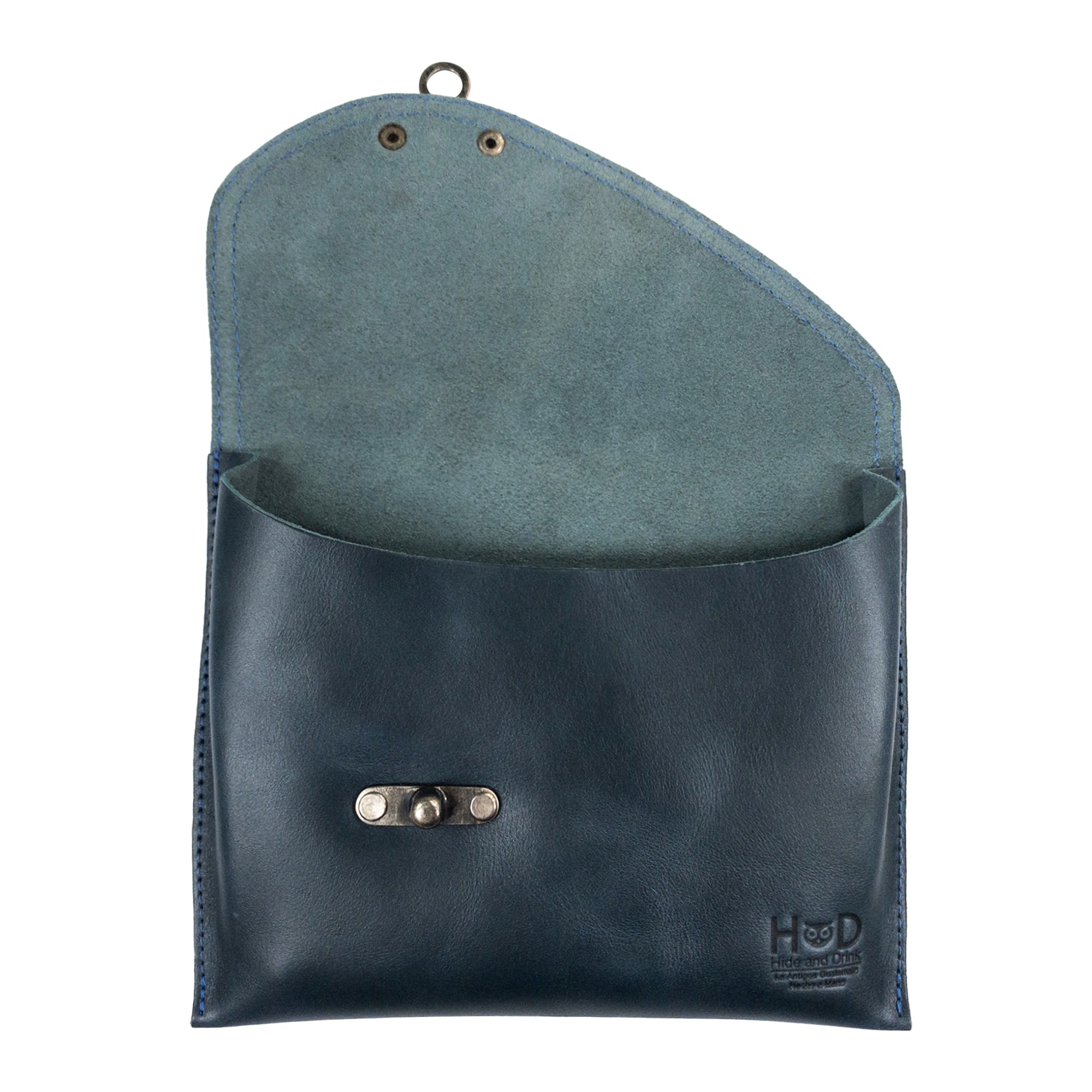 Inside view of the navy Petite Vintage Clutch Bag by Hide & Drink, showing its soft interior. This best-selling vintage handbag crafted from full grain leather is ideal as an evening bag or travel accessory, emphasizing the artisanal approach of small batch production in La Antigua Guatemala & Oaxaca Mexico.