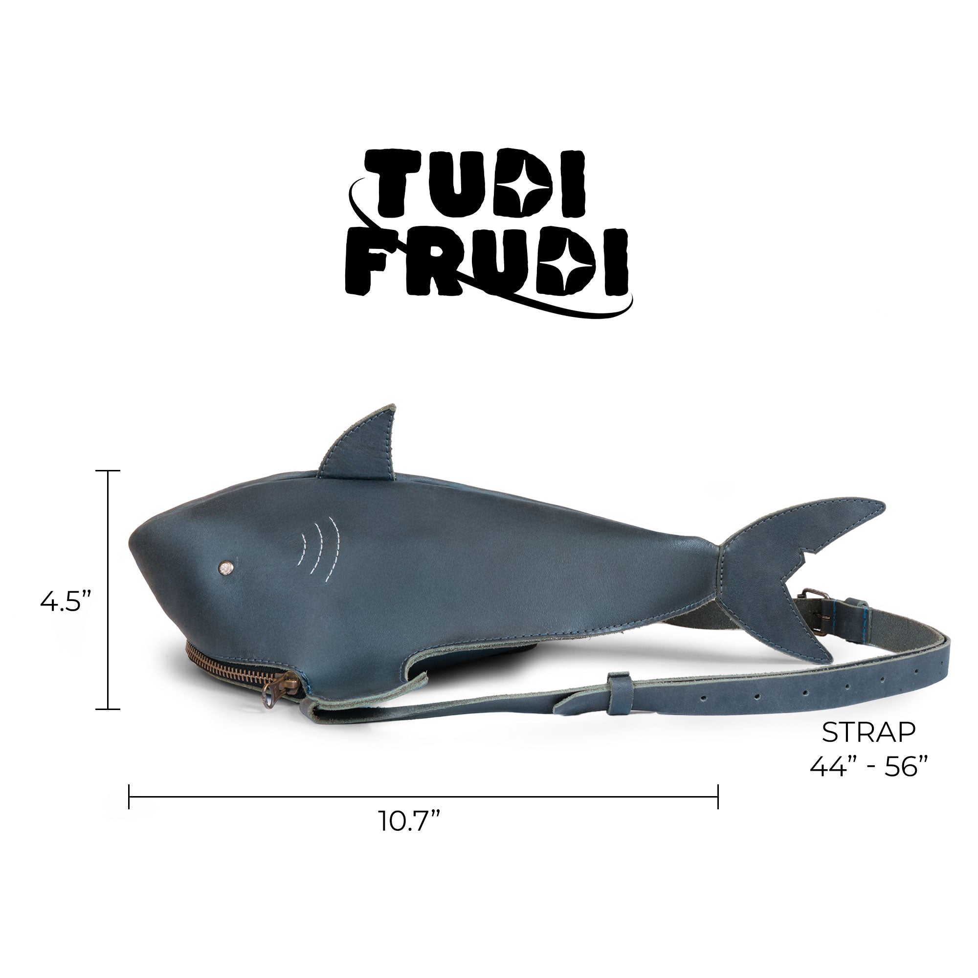 Tudi Frudi's Shark-Shaped Shoulder Bag presented with branding tags, showcasing unique artisan craftsmanship. This eye-catching Crossbody Shoulder Messenger Bag made from full grain leather, emphasizes its handmade quality, crafted in La Antigua Guatemala.