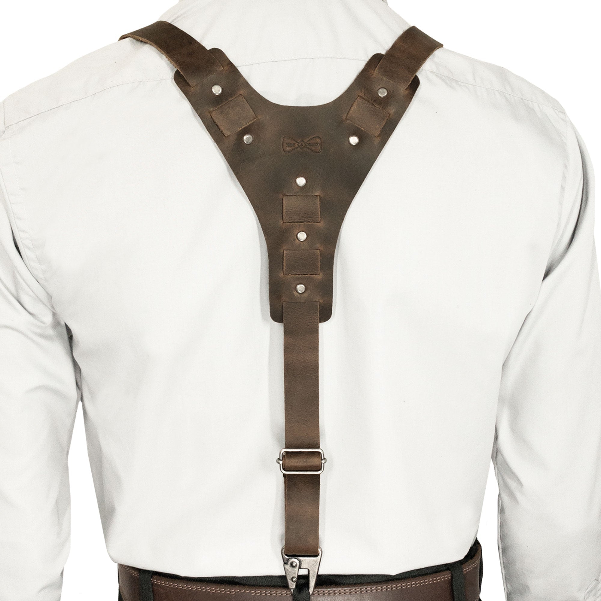 Back view of Rustic Y Back Suspenders from Hide & Groom, highlighting their sturdy design. Ideal for groomsmen and bachelors, these suspenders made of full grain leather are handmade in La Antigua Guatemala, featuring artisan techniques perfect for wedding ceremonies and dinner parties.
