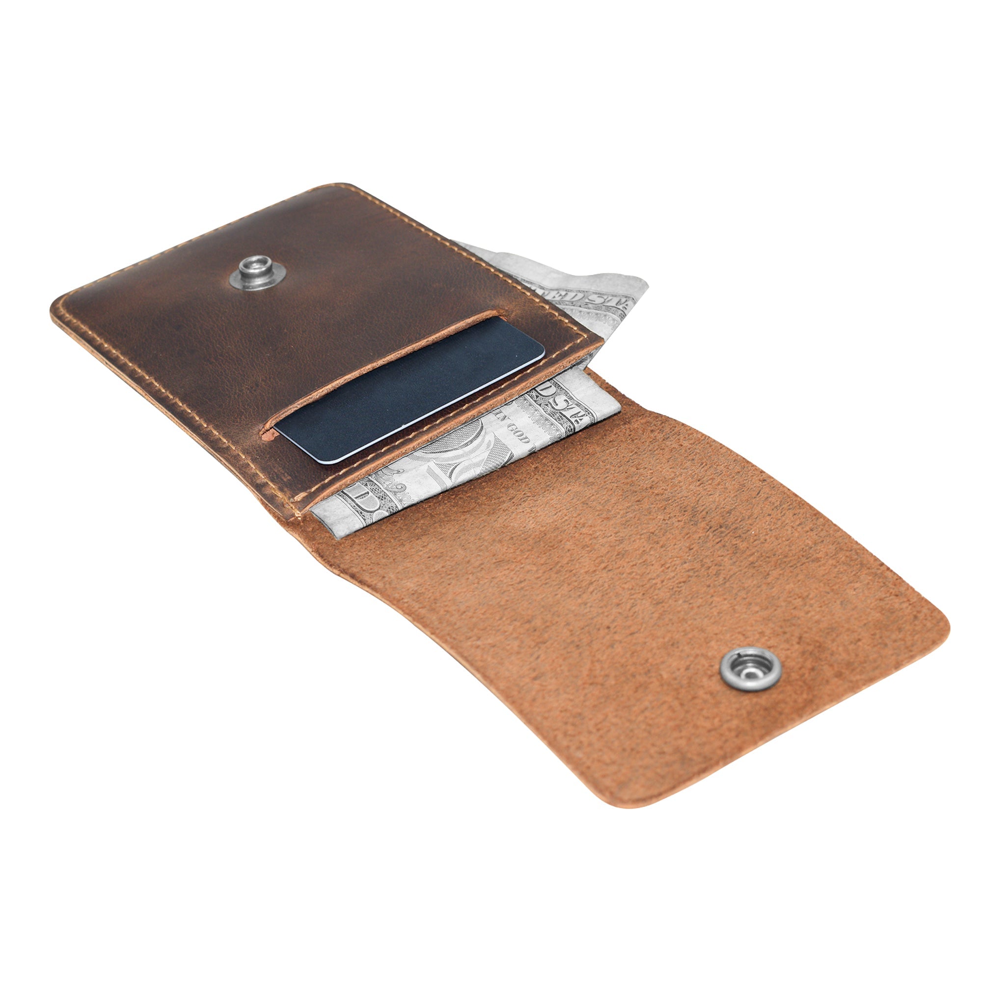 Interior view of the Vertical Wallet by Hide & Drink displaying storage for cards and cash, a perfect compact storage solution. This Vertical Front Pocket Wallet with Card Slot is made of full grain leather, representing small batch production with hand cut and hand sewn finishes, fire branded by artisans. Handmade in La Antigua Guatemala & Oaxaca Mexico.