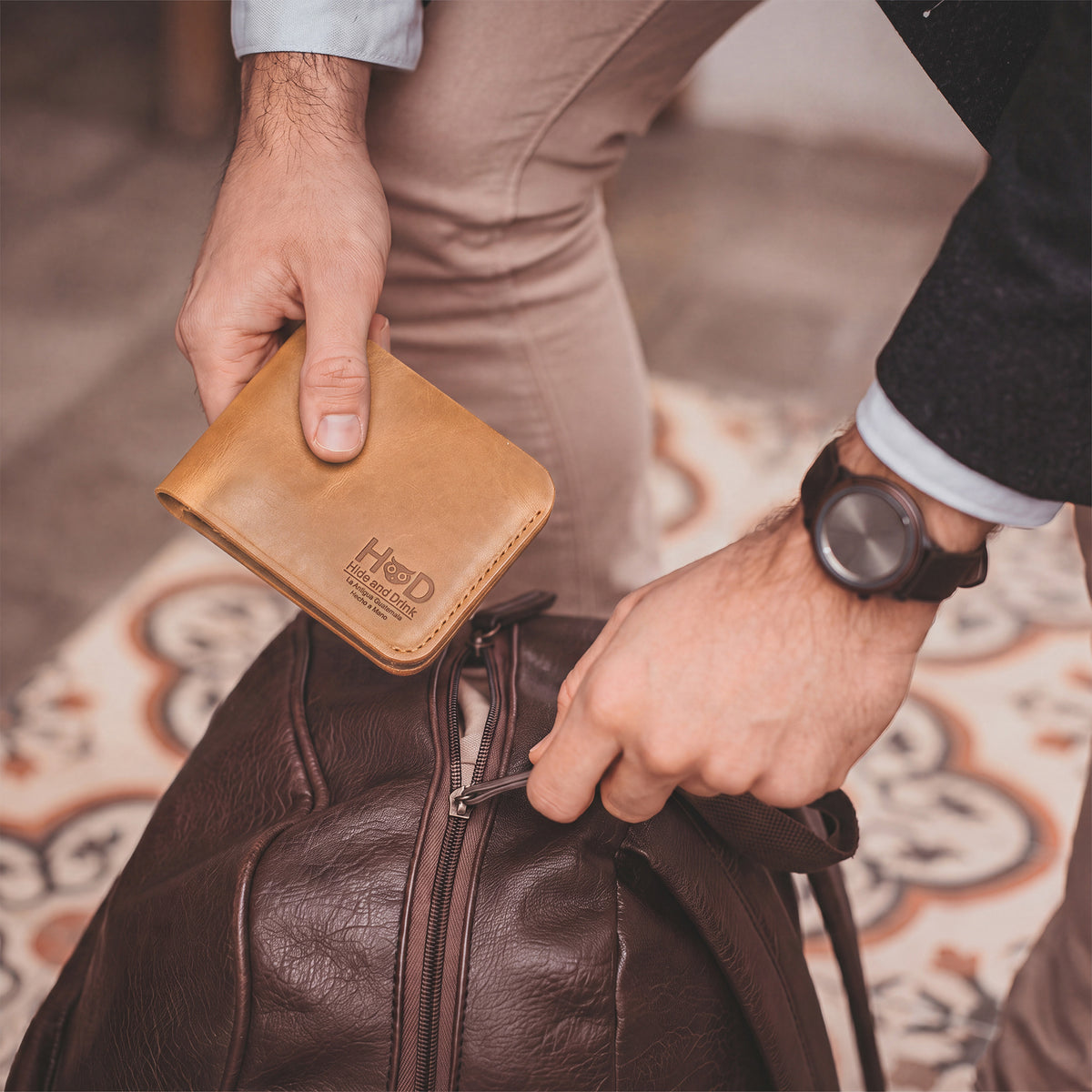 Side view of the Hide & Drink Minimal Wallet, showcasing its rich texture in dark brown Full Grain Leather. This Classic Slimfold Wallet acts as a stylish Card Organizer Holder and Travel Accessory made through Small Batch Production methods by artisans in La Antigua Guatemala & Oaxaca Mexico.