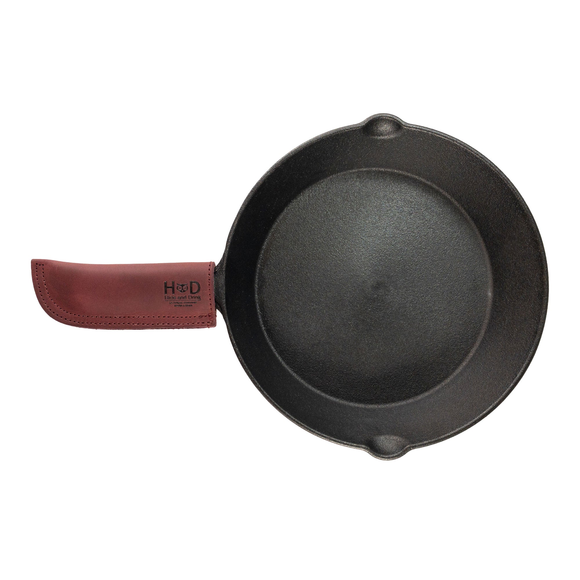 Hide & Drink Cast Iron Panhandle Cover elegantly shown with dimensions. This artisan hot handle protector, made from double stitched full grain leather, combines safety and style. Handmade in La Antigua Guatemala & Oaxaca Mexico, it's a perfect fit for any kitchen.
