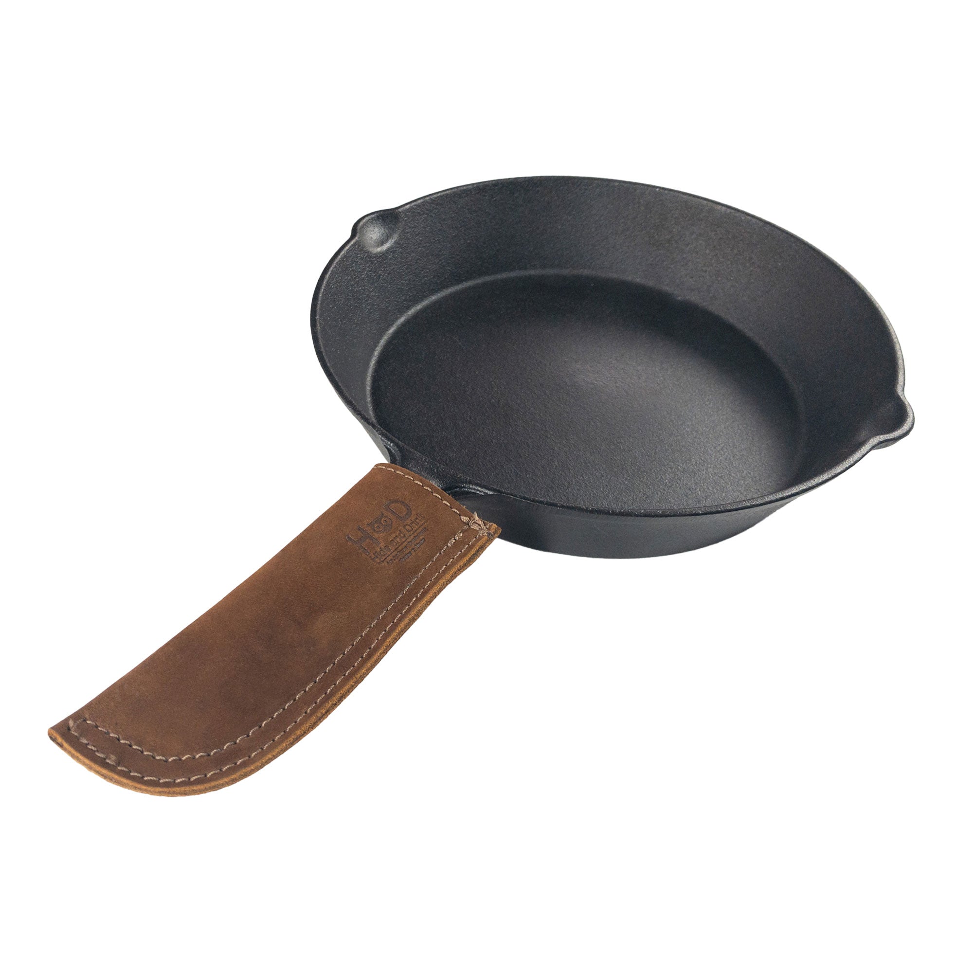Hot Pan Handle Cover by Hide & Drink, demonstrating an elegant design made for better grip and heat protection for cookware, handmade in La Antigua Guatemala & Oaxaca Mexico.