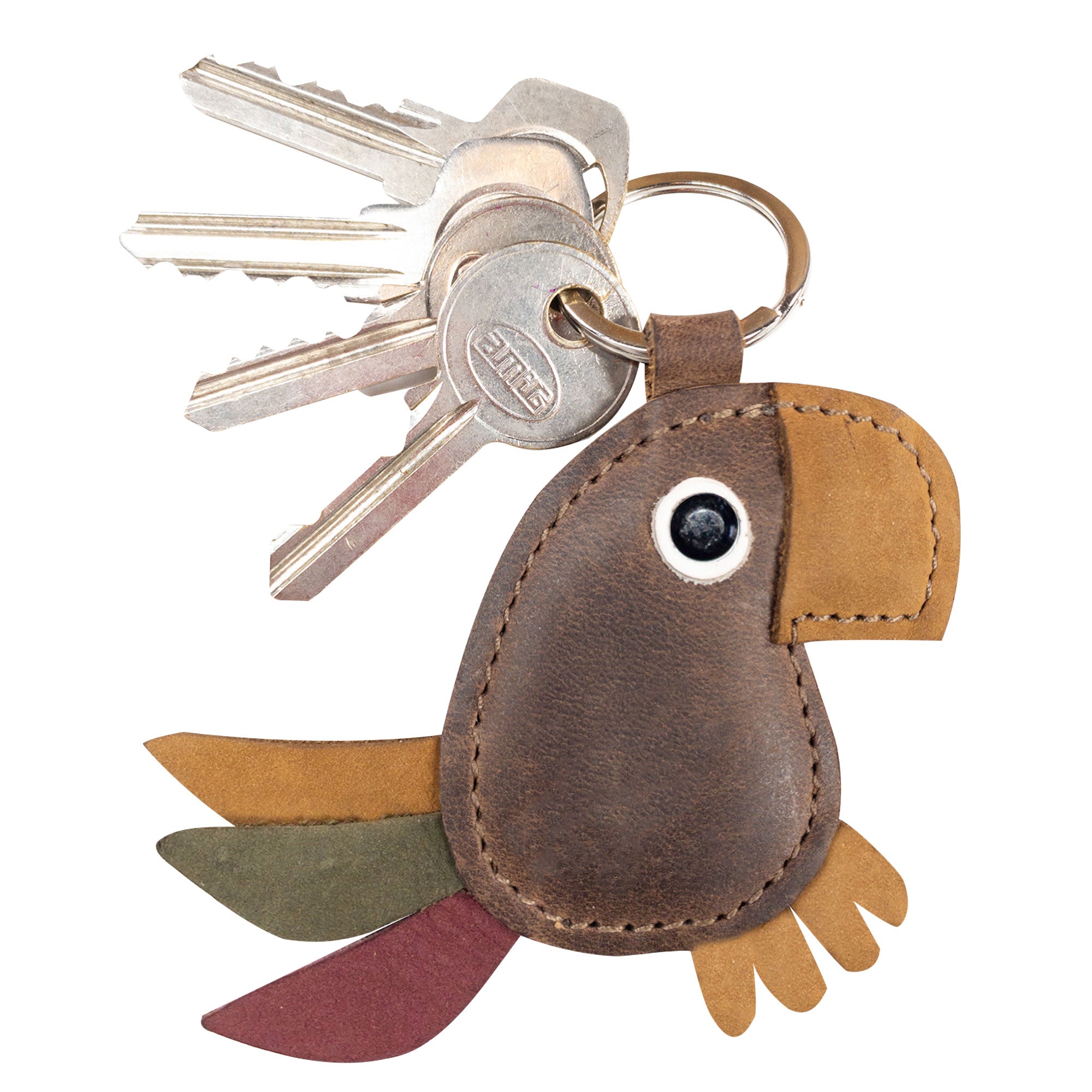 A close-up of Hide & Drink's Toucan Keychain, perfect for key organization while showcasing artisan craftsmanship. Made of full grain leather, this animal-shaped keyring doubles as a chic ornament for bags. Handmade in La Antigua Guatemala & Oaxaca Mexico, it reflects small batch production techniques, including hand cut and hand sewn methods.