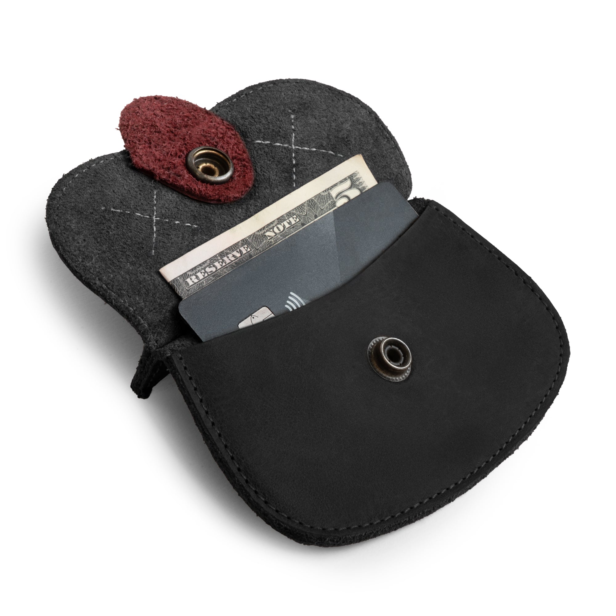 Hide & Drink Leather Cat Wallet with a creative cat styling. This Full Grain Leather Cat-Shaped Wallet serves as a trendy Coin Pouch and Travel Accessory, handmade by artisans in La Antigua Guatemala & Oaxaca Mexico.