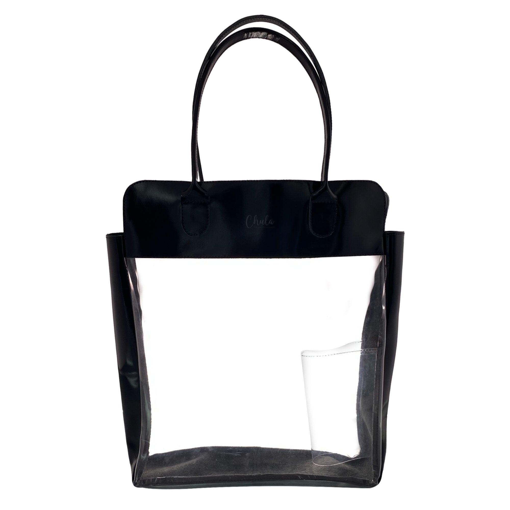 Chula Female Purse with Insider Bottle Holder displayed with a clear PVC front, emphasizing its modern look as a Rectangular Purse or Tote Bag. Made with durable Full Grain Leather, this carry-on bag includes a hidden bottle holder and exemplifies artisan craftsmanship, Hand Cut and Hand Sewn in La Antigua Guatemala.