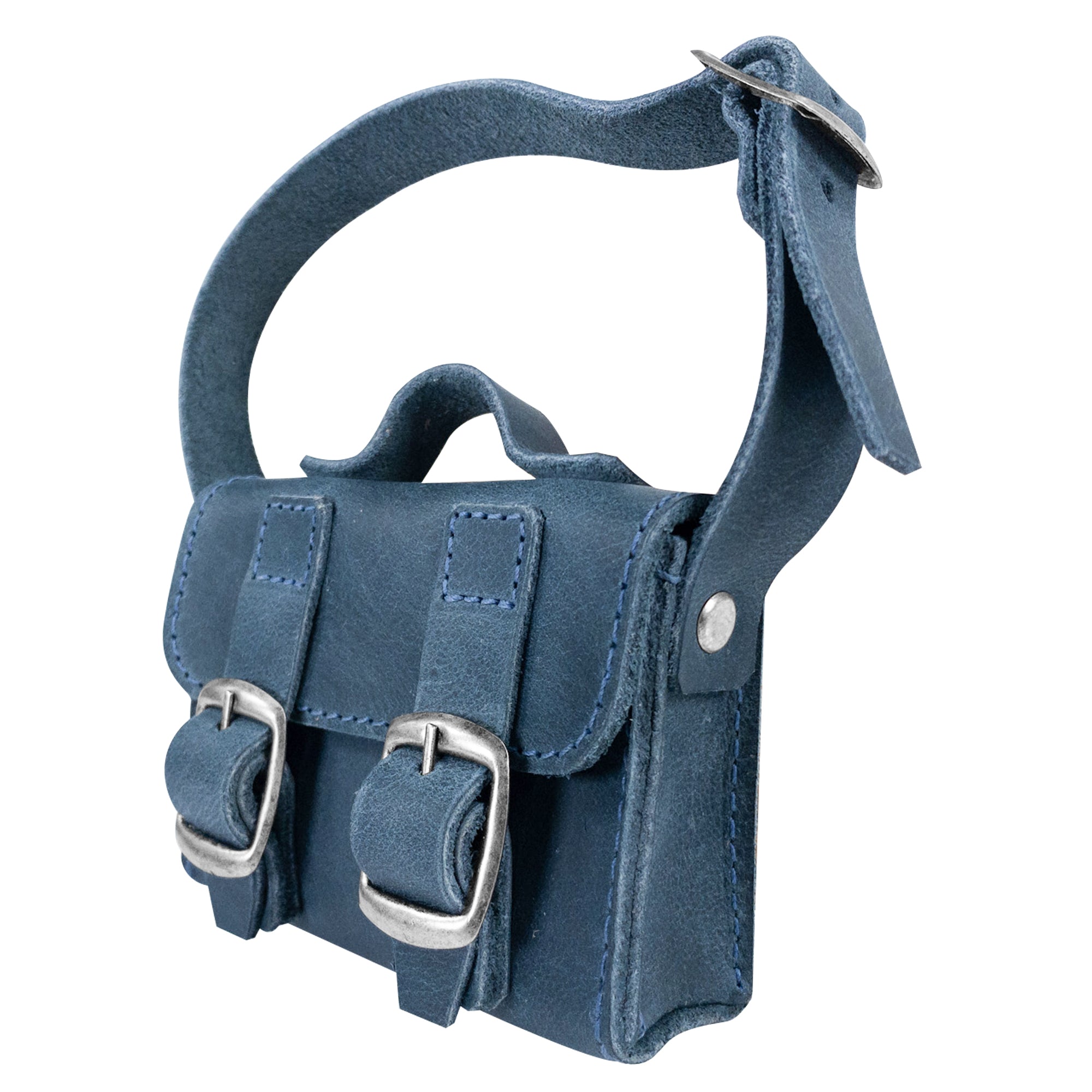 Side view of the deep blue Tiny Messenger Bag by Hide & Drink, showcasing its quality Full Grain Leather craftsmanship. This Mini Messenger Bag Charm is an ideal addition to any keychain or handbag, reflecting skilled artisan production from La Antigua Guatemala.