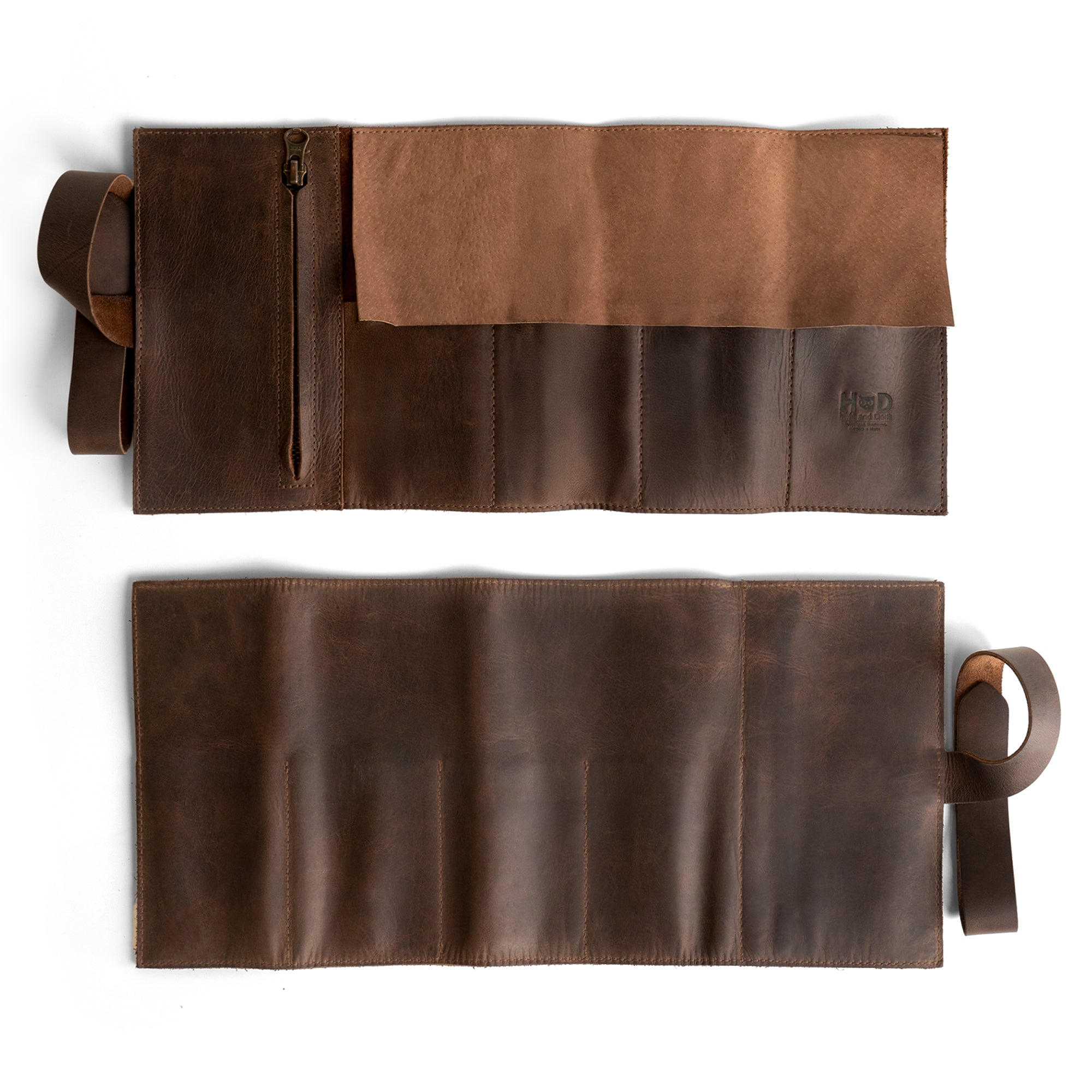 Hide & Drink Premium Watch Roll presented in an open view to highlight its generous size and functionality, complete with a zippered pouch. This watch roll organizer is crafted from full grain leather, making it a perfect gift for travel-loving watch enthusiasts. Each piece showcases handmade detail from artisans in La Antigua Guatemala and Oaxaca Mexico.