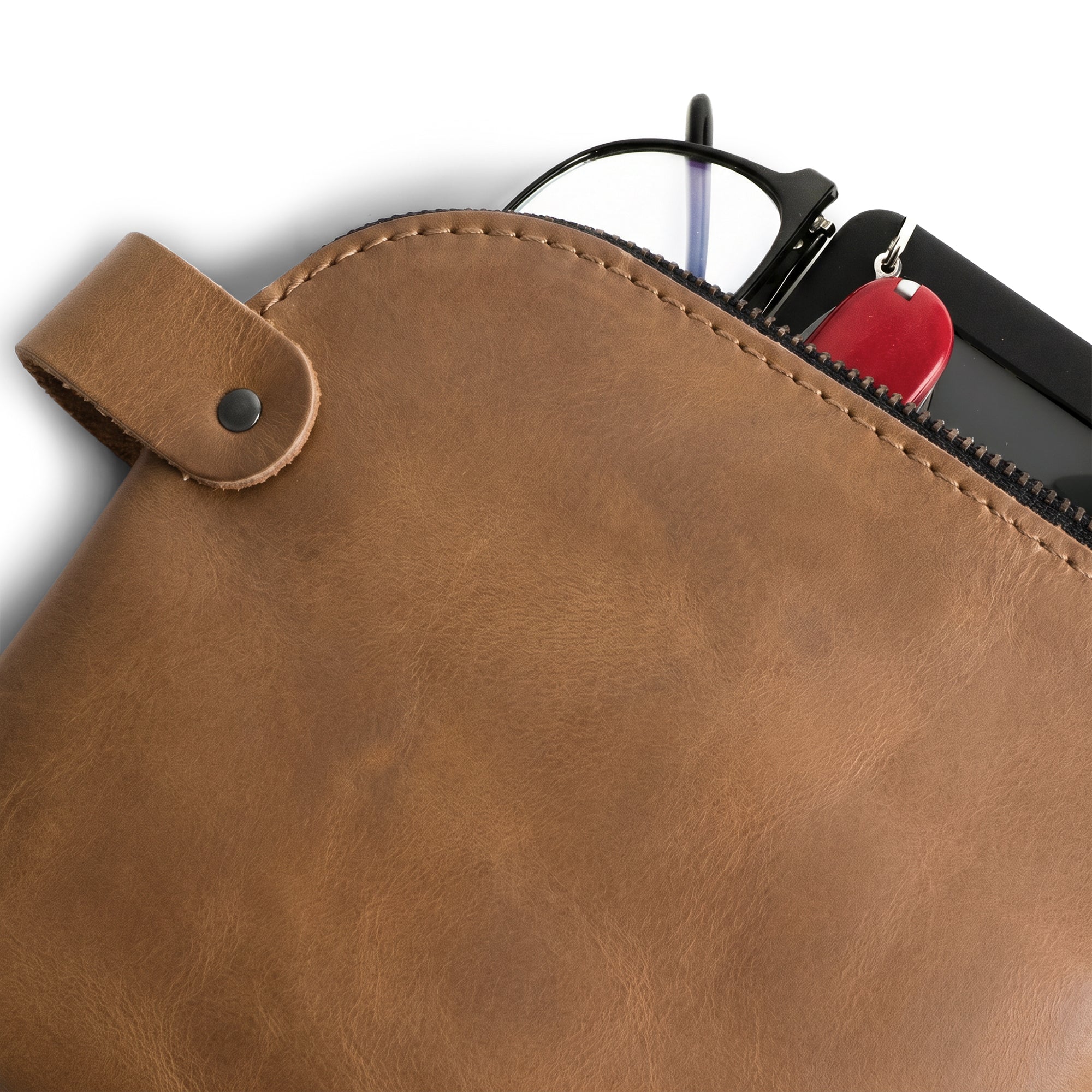 Dopp Kit Utility Bag by Hide & Drink featured in a practical setup. This large rustic all-purpose Dopp Kit Utility Bag is crafted from full grain leather, showcasing artisan skills like hand cut and hand sewn details for durability, handmade in La Antigua Guatemala & Oaxaca Mexico.