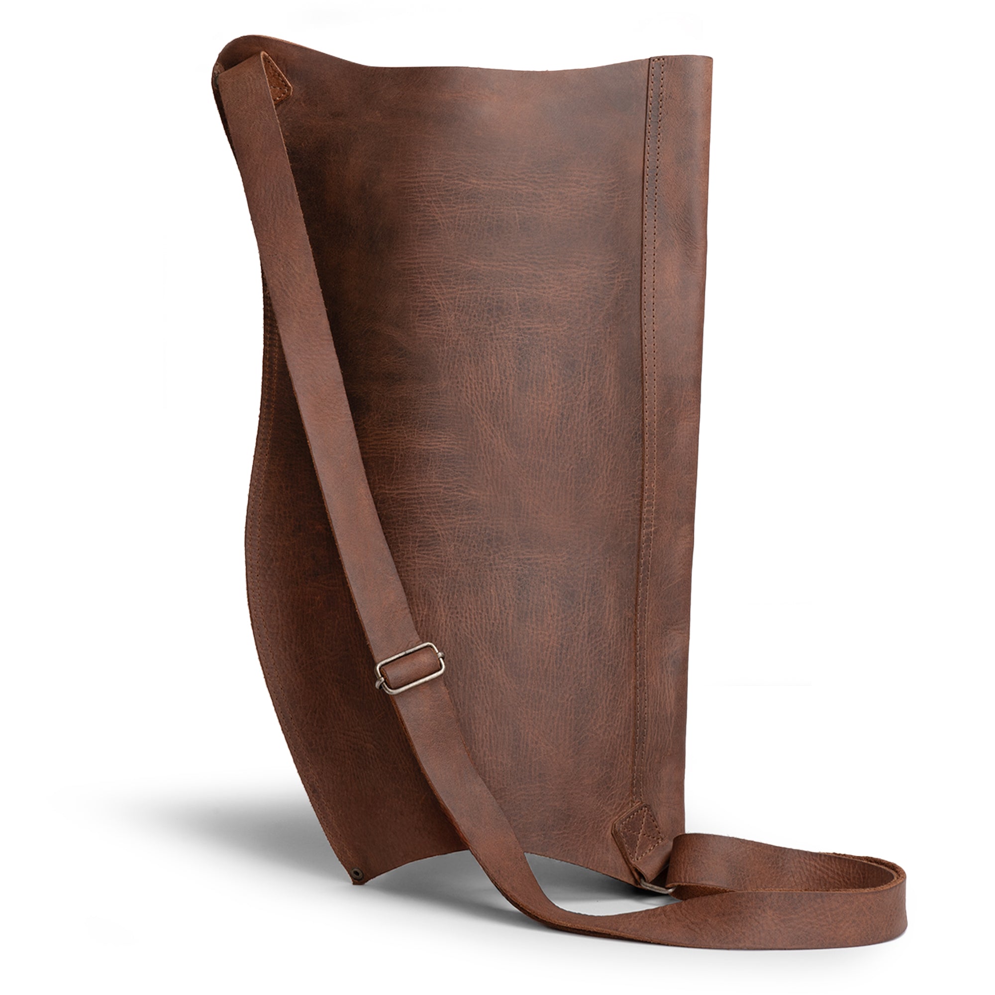 Back view of Valhalla Gear's Archery Bow Carrier with Arrow Slots, emphasizing its sleek shape. Made from durable full grain leather, this carrier offers an adjustable shoulder strap, blending function with style for shooting, training, and cosplay. Hand cut and hand sewn by artisans in La Antigua Guatemala.