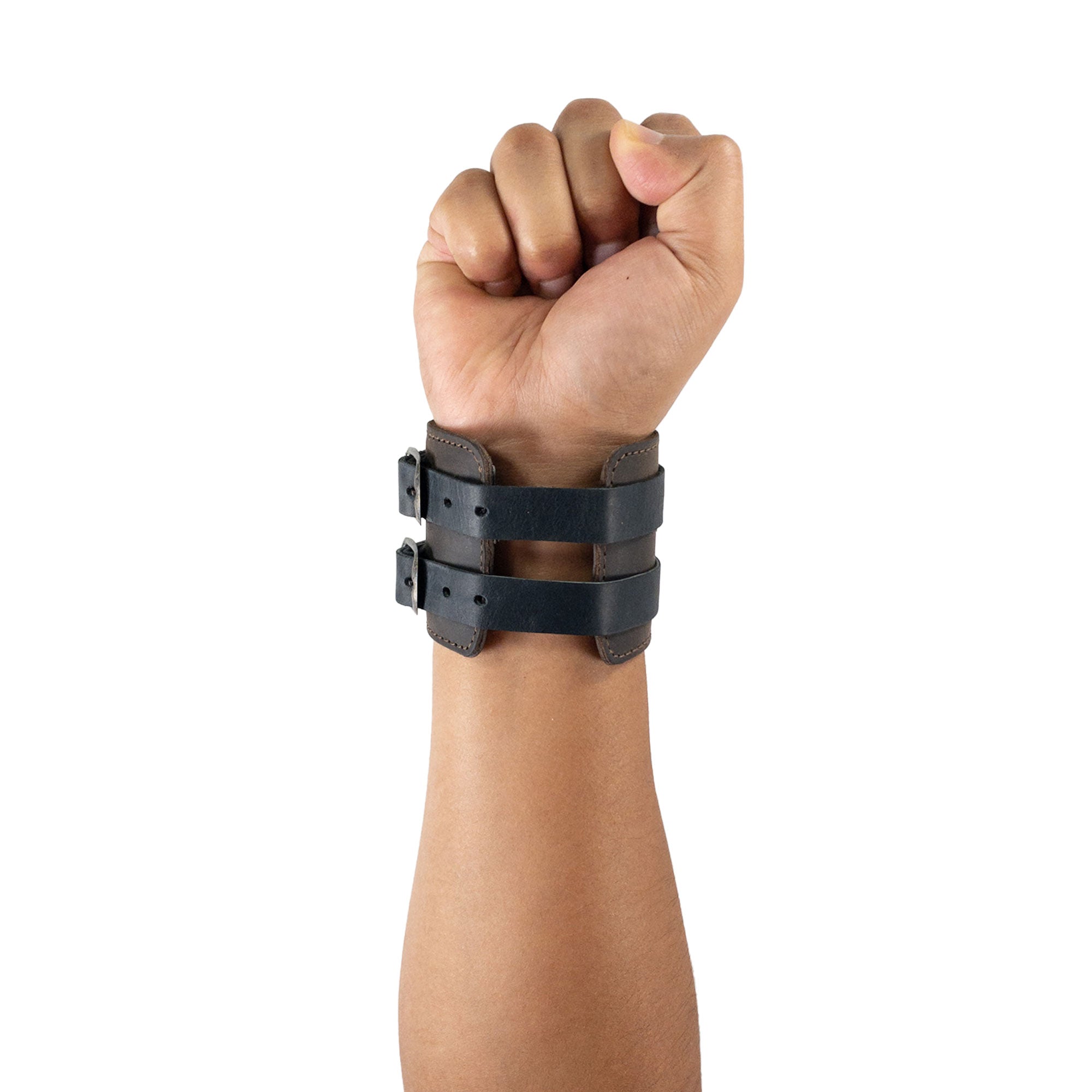 Showcasing the functionality of Hide & Drink's Wrist-Wallet-Cuff made from Full Grain Leather. This rustic leather bracelet includes a hidden pouch for bills and an inner zippered pouch, perfect for modern needs. Handmade in La Antigua Guatemala & Oaxaca Mexico, each piece exemplifies artisan craftsmanship.