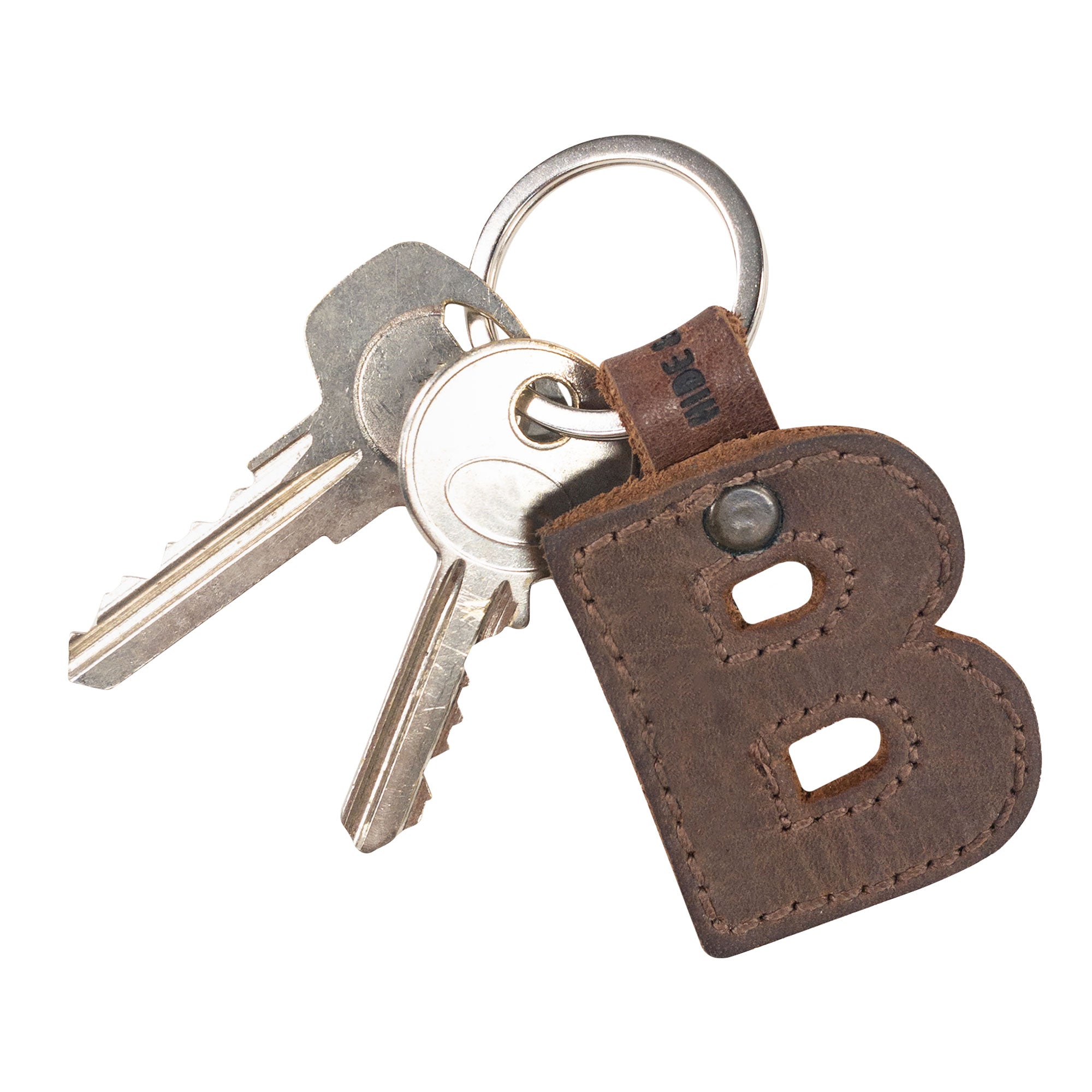 Stylish 'B' Alphabet Letter Keychain by Hide & Drink attached to keys, made from thick leather. A perfect blend of style and durability, handcrafted in La Antigua Guatemala.