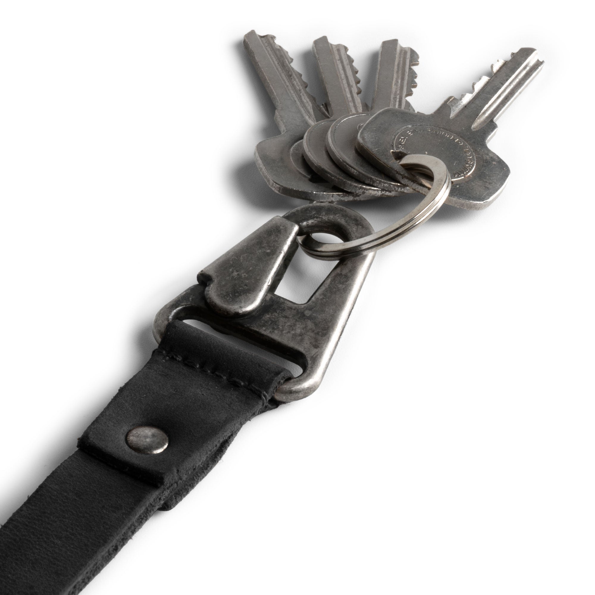 Lanyard Keychain from Hide & Drink, showcasing a strong hook and crafted from high-quality black full grain leather. Perfect for men and women who appreciate artisan handmade pieces from La Antigua Guatemala & Oaxaca Mexico.