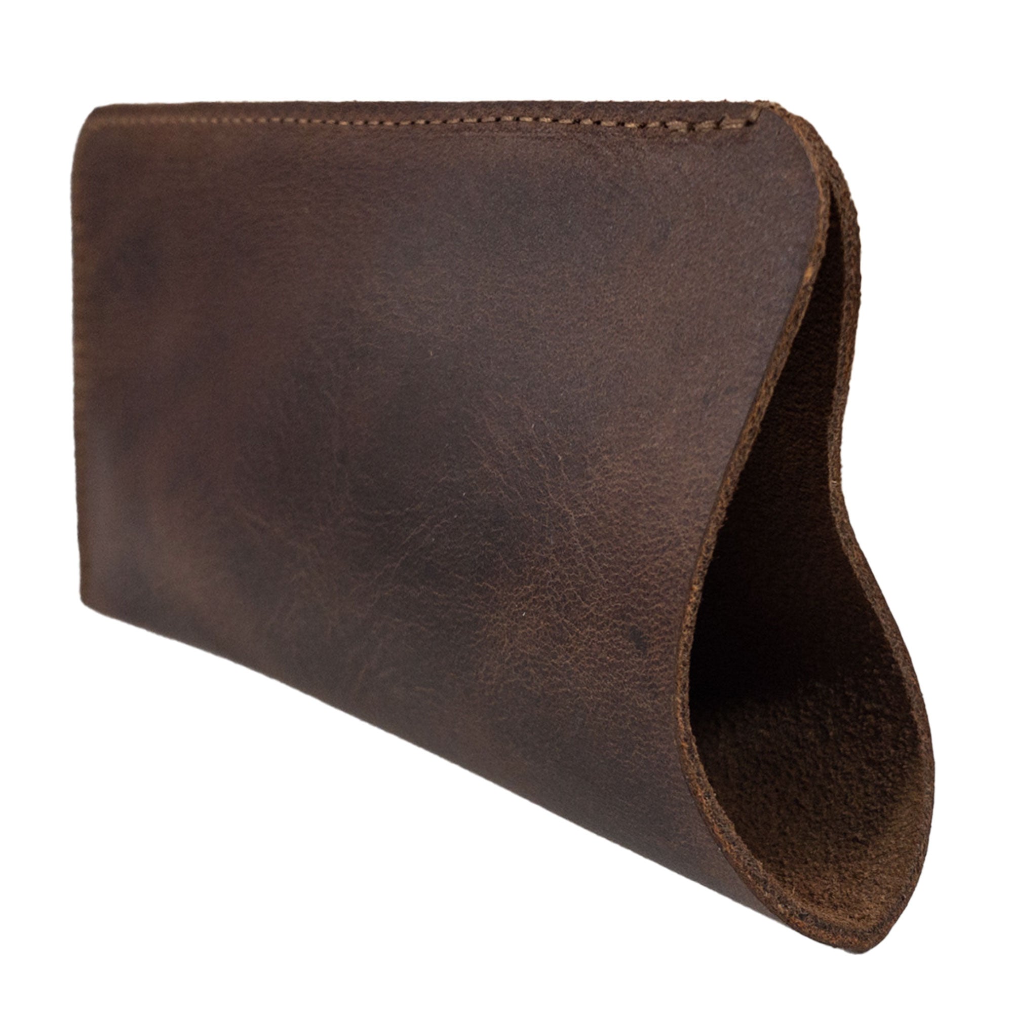 Hide & Groom Set of 2 Sunglasses Case close-up of a single leather eyeglass sleeve, highlighting the quality craftsmanship. These handmade accessories offer safe storage for travel, featuring artisan techniques in full grain leather from La Antigua Guatemala & Oaxaca Mexico.