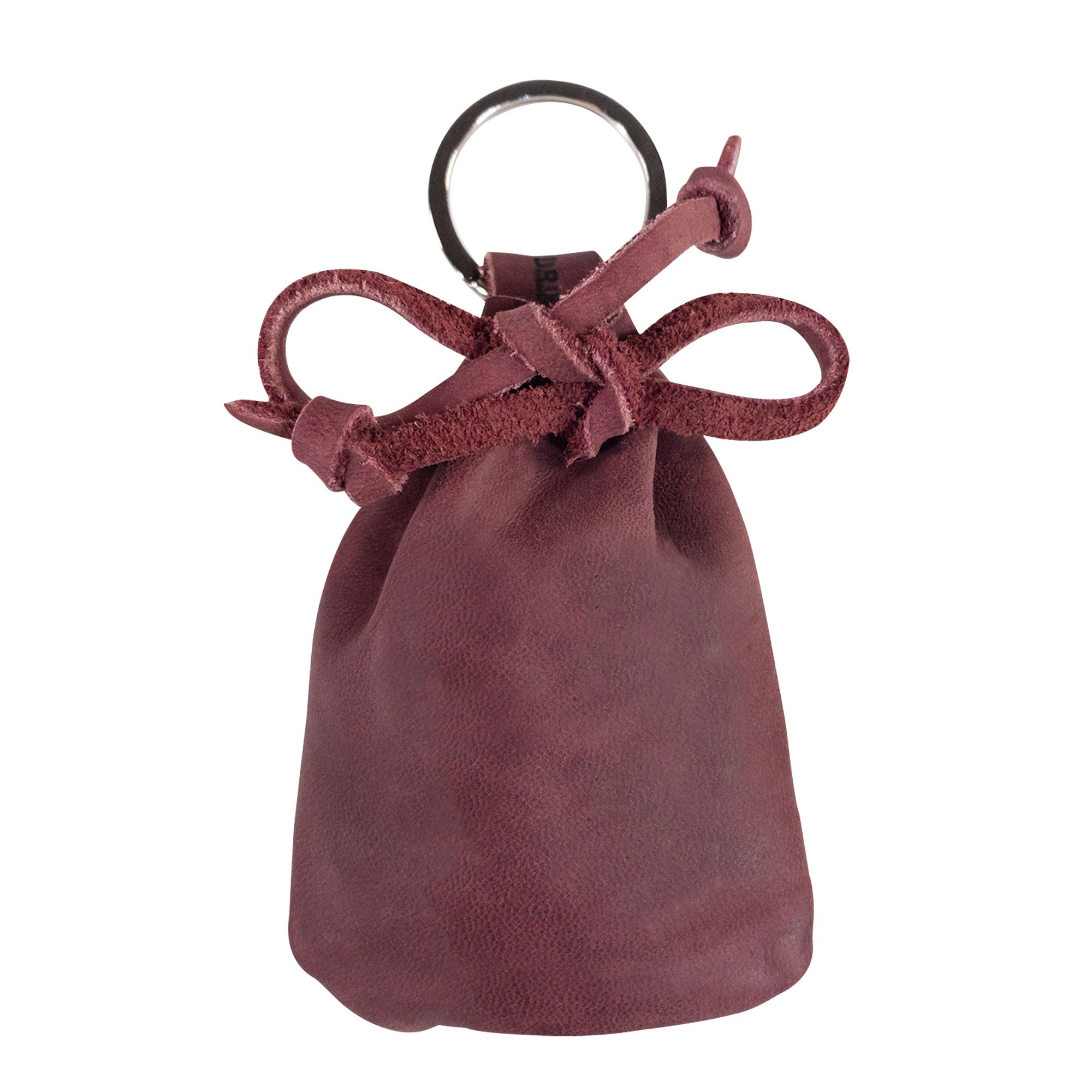 The Mini Medieval Pouch Keychain by Hide & Drink designed with a focus on functionality and appeal. This tiny bag with keyring is made from full grain leather, perfectly serving as a coin pouch with artisan craftsmanship from La Antigua Guatemala.