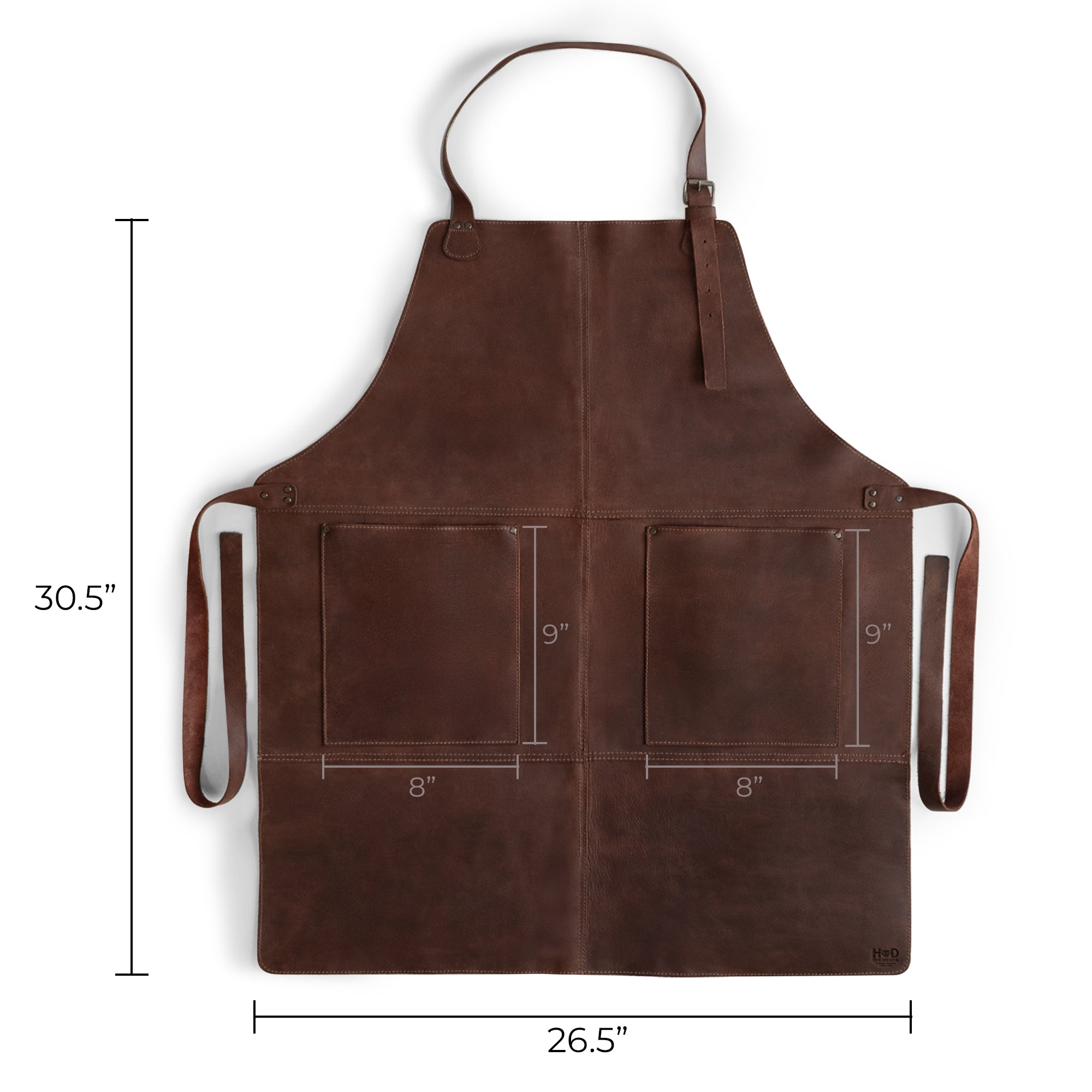 Measurements of the Hide & Drink Leather Apron emphasizing its practicality with dimensions showcased along with large pockets, perfect for carrying tools. This full grain leather apron ensures style and durability in one.