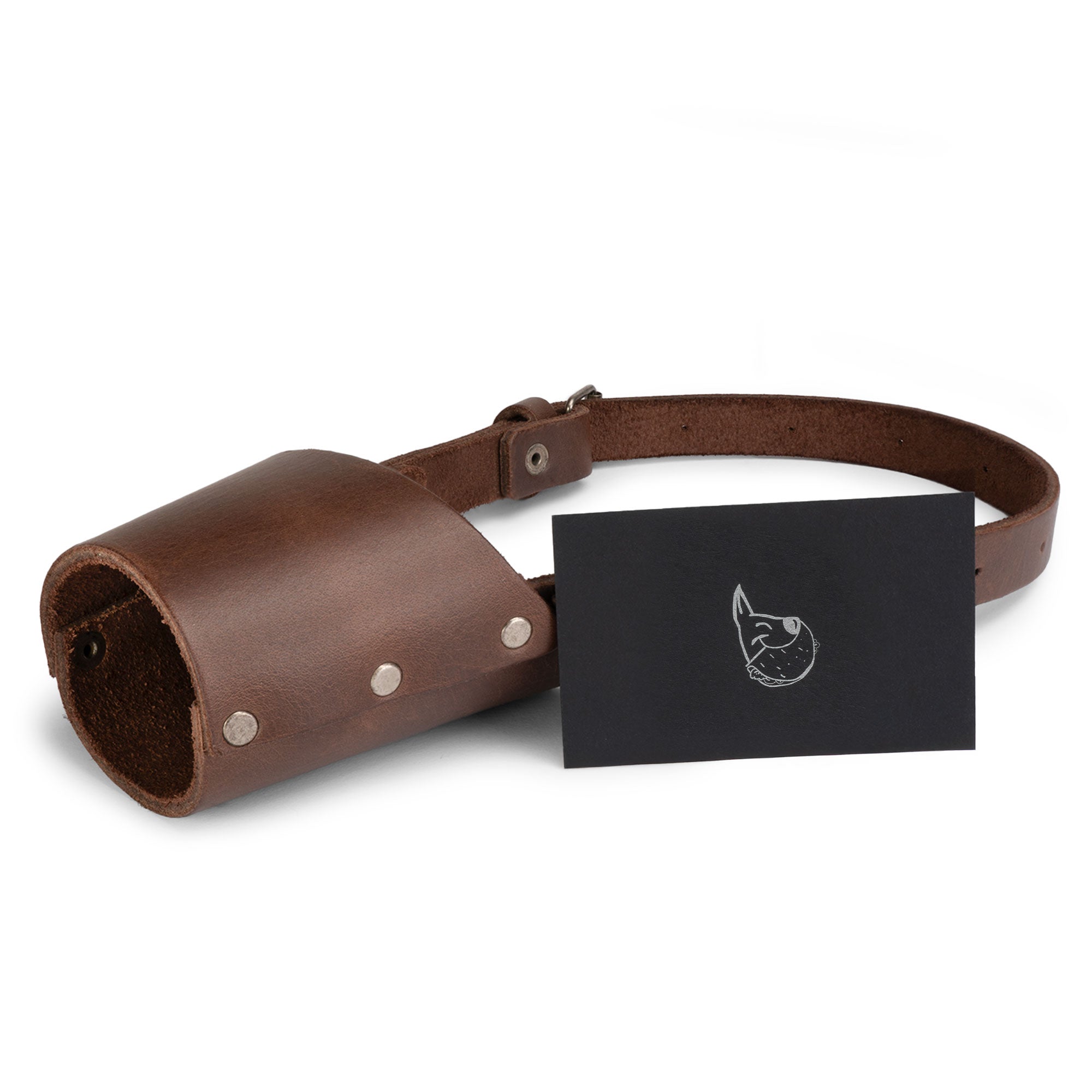 Taco Dog Dog Muzzle with a classy card, showcasing its craftsmanship in full grain leather. This muzzle not only prevents biting and chewing but also keeps your dog secure and stylish.