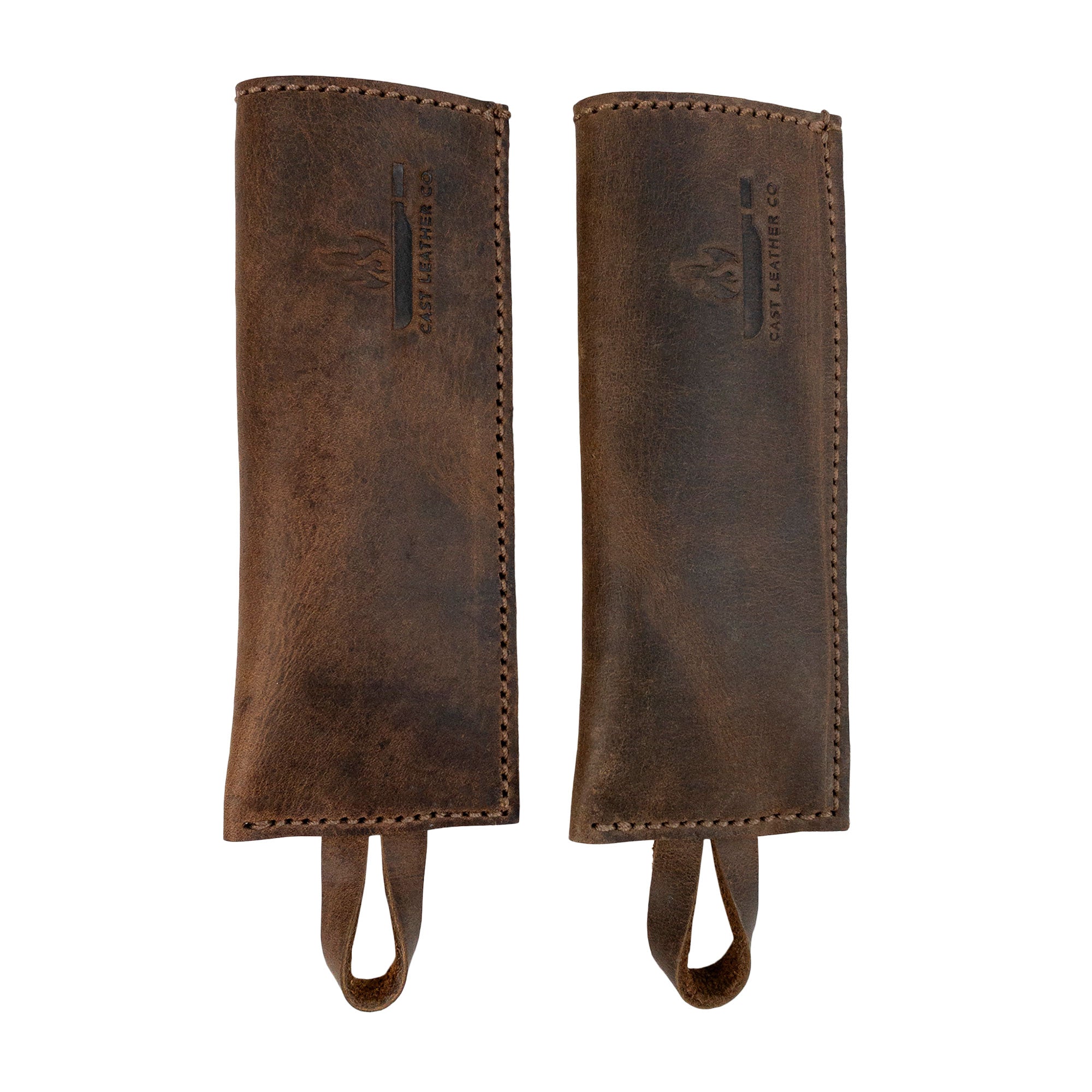 Two Set of 2 Rectangular Pan Handle Covers by Cast Leather Co. displayed together, demonstrating their stylish full grain leather exterior as a sleeve for metal skillet grip. These handmade artisan kitchen accessories are created through small batch production in La Antigua Guatemala & Oaxaca Mexico.