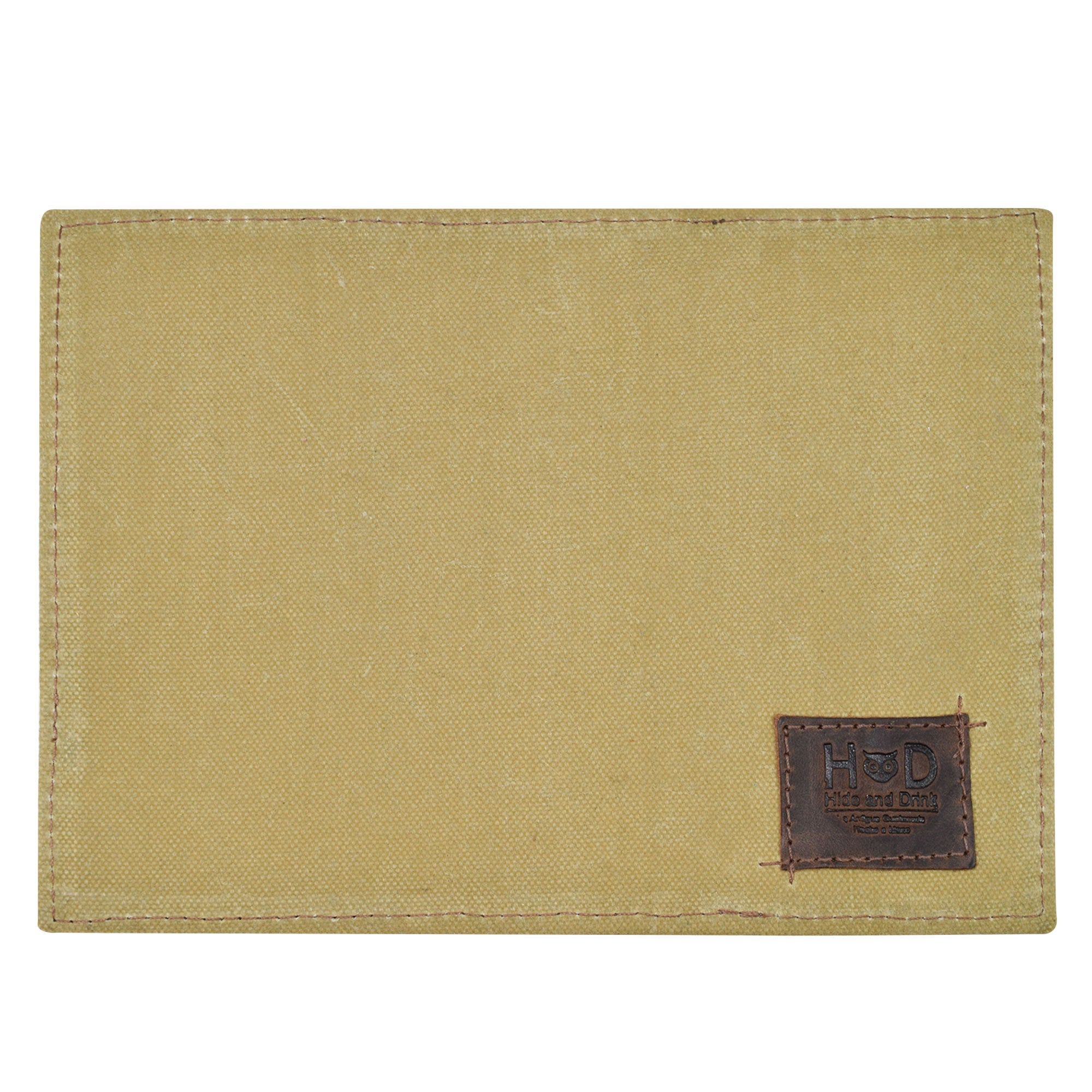 Another view of the Hide & Drink Waxed Canvas Field Notes Cover, showcasing its practical design. This journal cover not only looks great but is also perfect for daily use, featuring compartments that reflect the craftsmanship of small batch production.