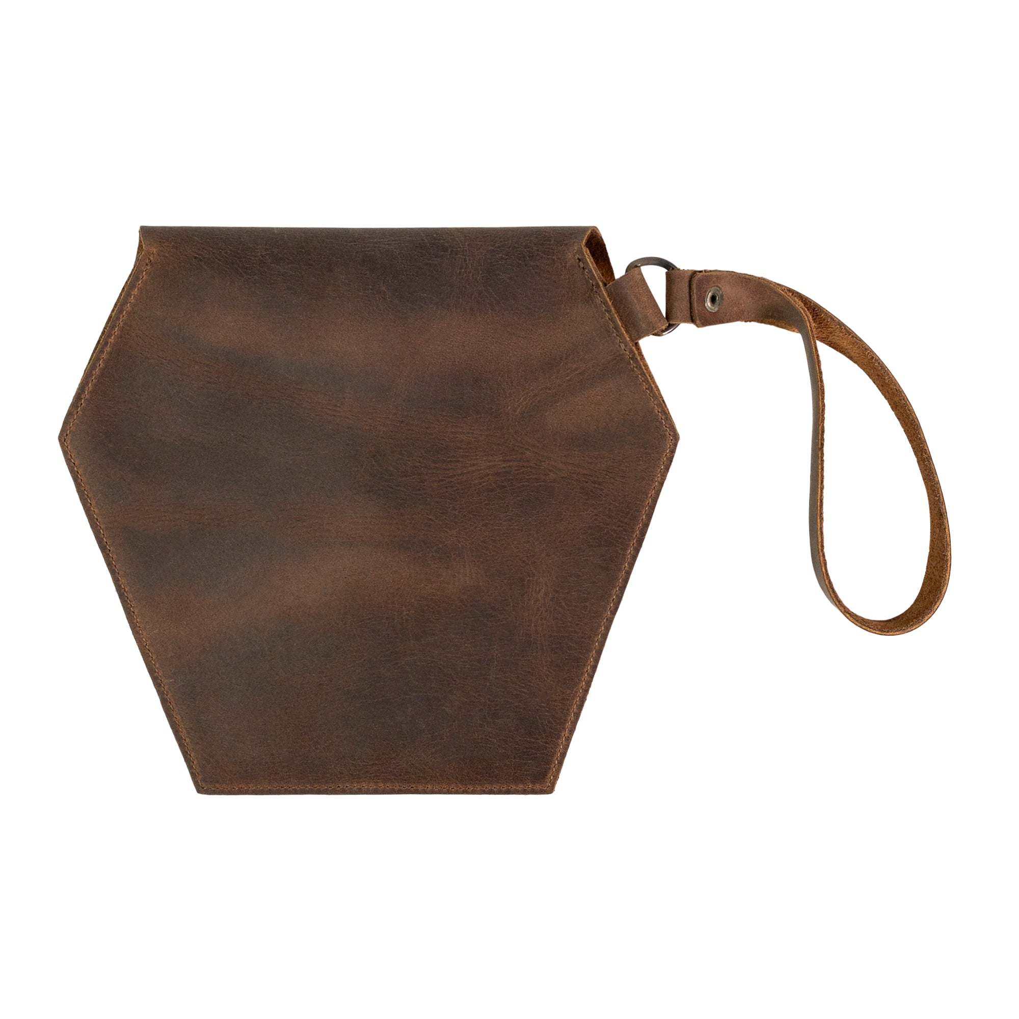 Back view of Heather's Hexagonal Clutch Bag, designed in elegant brown leather. This unique bag with wristlet strap is perfect as a travel handbag for makeup and toiletry items. Each piece is handcrafted from Full Grain Leather, ensuring quality and durability from small batch production in La Antigua Guatemala & Oaxaca Mexico.