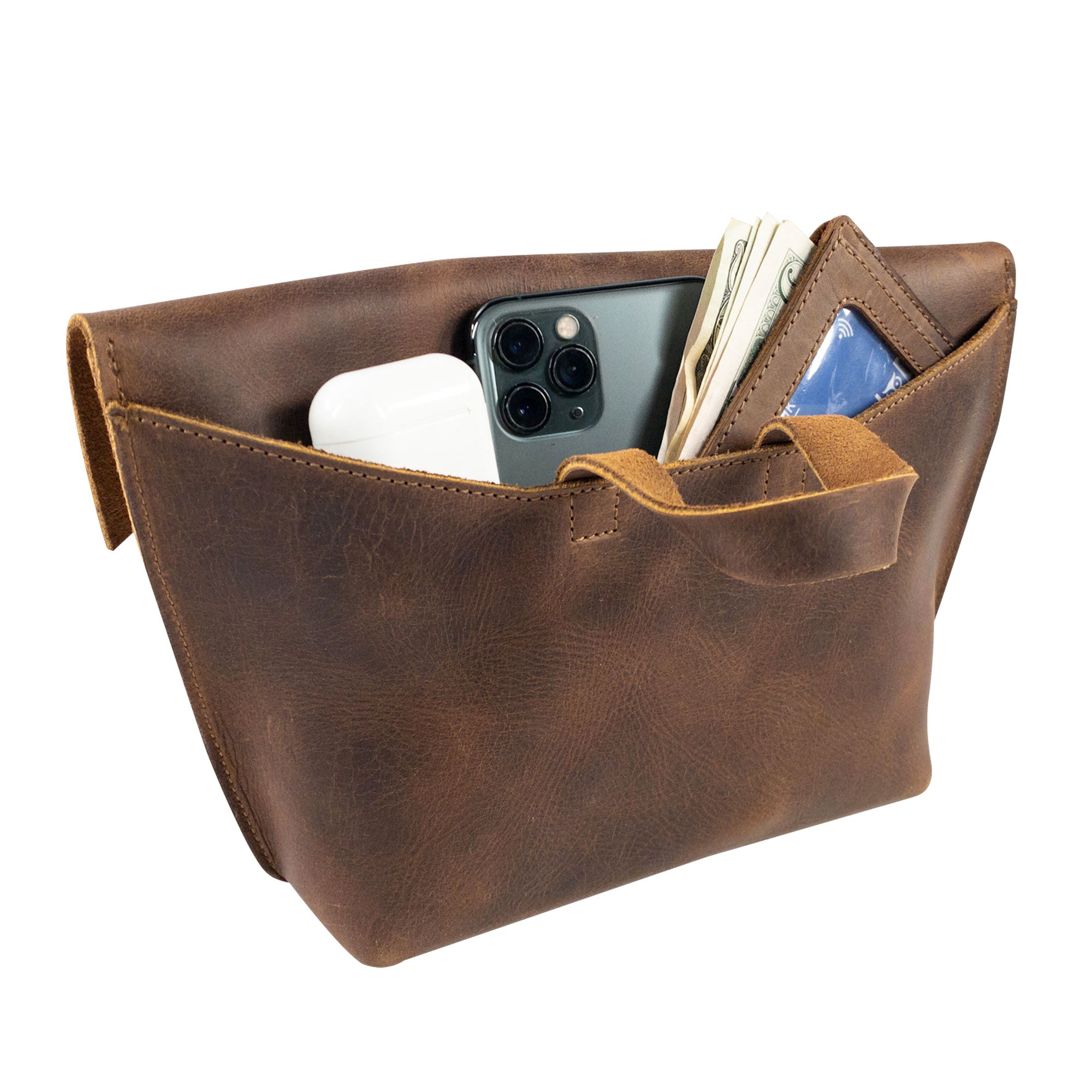 Women's Clutch Bag by Heather's with visible compartments for holding a phone and wallet, combining style and organization as a practical accessories pouch. Made from durable Full Grain Leather, this artisan product boasts small batch production traits.