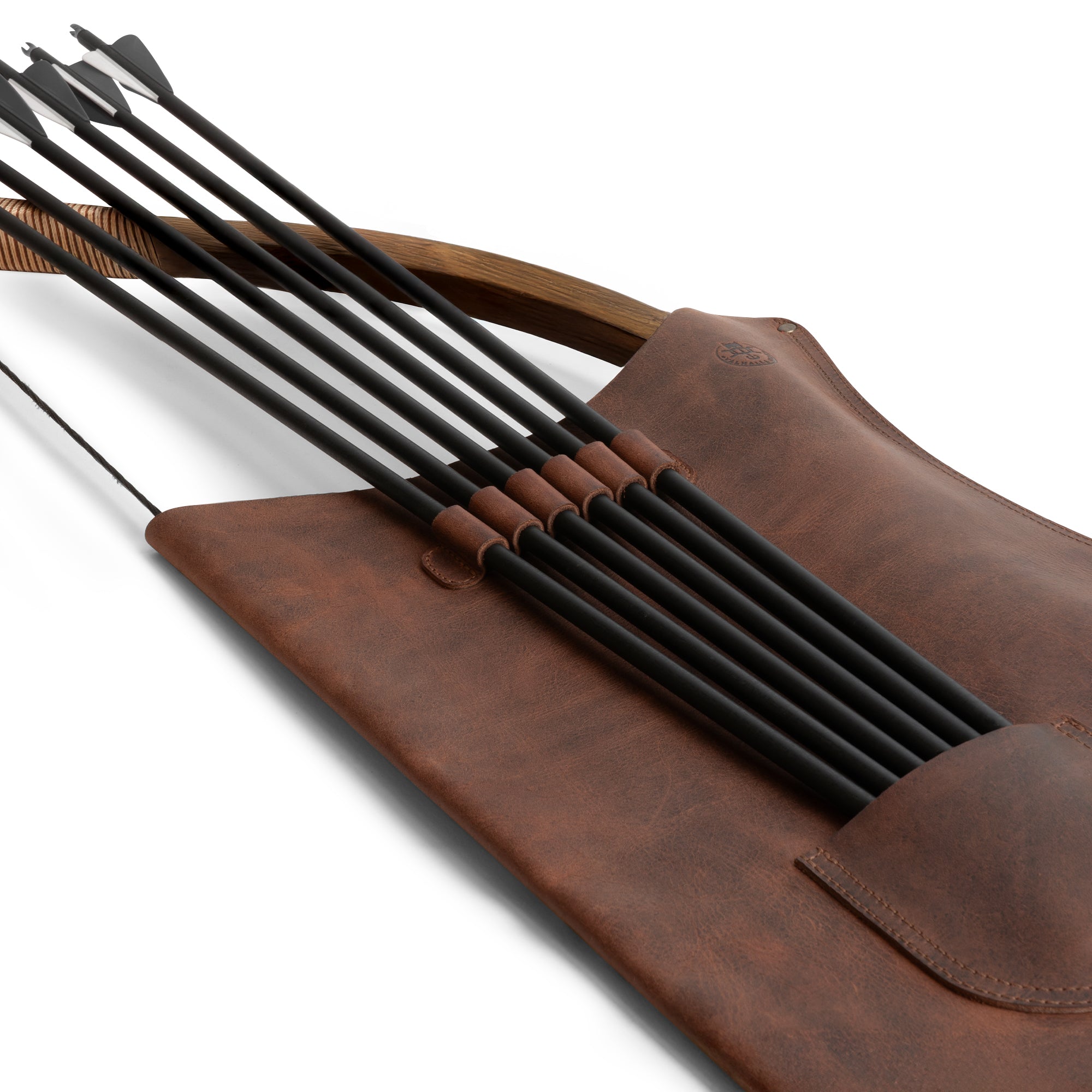 Close-up of the Archery Bow Carrier with Arrow Slots by Valhalla Gear, featuring a slot for arrows. Crafted from high-quality full grain leather, this carrier is ideal for archery training and cosplay, showcasing handmade artisan quality and small batch production from Guatemala.