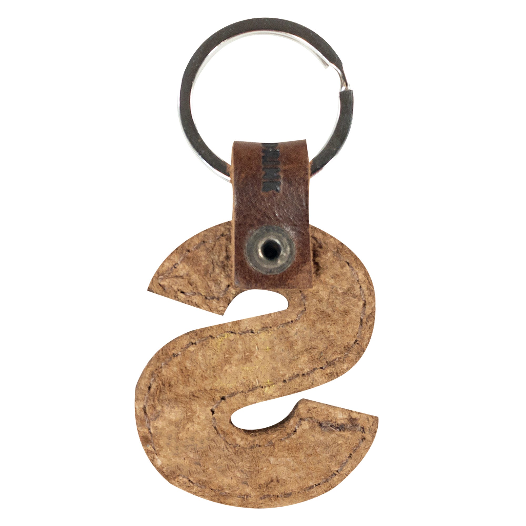 Overview of letter S in thick leather Alphabet Letter Keychain by Hide & Drink. This stylish piece made of Full Grain Leather showcases the artisan's dedication to small batch production in La Antigua Guatemala.