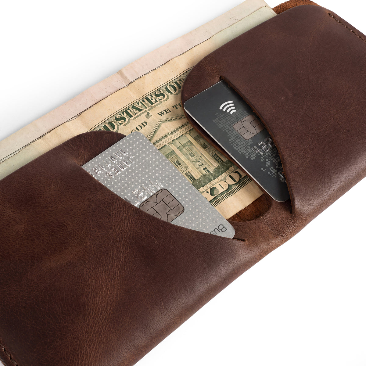 Open view of the Hide & Drink Minimal Wallet, featuring its practical design as a Full Grain Leather Classic Slimfold Wallet. A perfect Card Organizer Holder and Travel Accessory, this handmade piece represents Small Batch Production by artisans in La Antigua Guatemala & Oaxaca Mexico, with unique Hand Cut and Hand Sewn qualities.