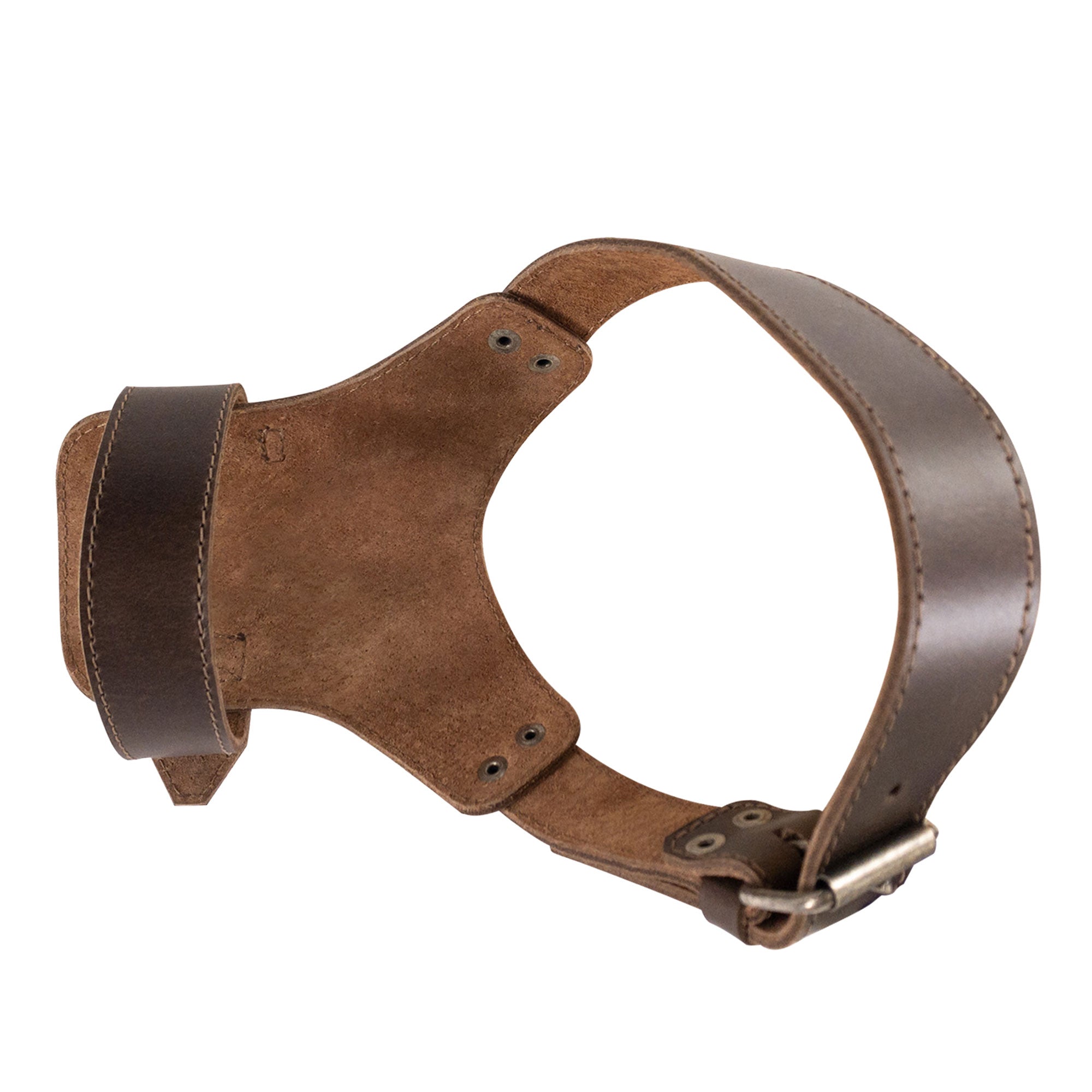 Inside view of the Adjustable Dog Muzzle by Taco Dog, showcasing its fit and craftsmanship. Made from full grain leather with a rustic guard design, this handmade pet accessory is perfect for preventing chewing, reflecting artisan quality from La Antigua Guatemala.