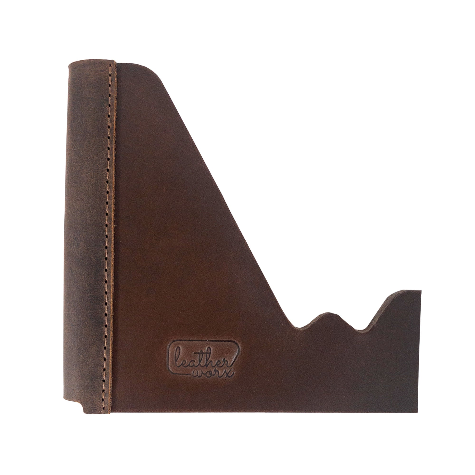 A side view of the Leather Worx Cell Phone Stand for Desk, emphasizing the elegant craftsmanship in its rustic foldable design. This Cell Phone Holder not only serves as a chic office accessory but also showcases the quality of full grain leather used in small batch production by artisans in La Antigua Guatemala & Oaxaca Mexico, featuring hand cut and hand sewn elements.