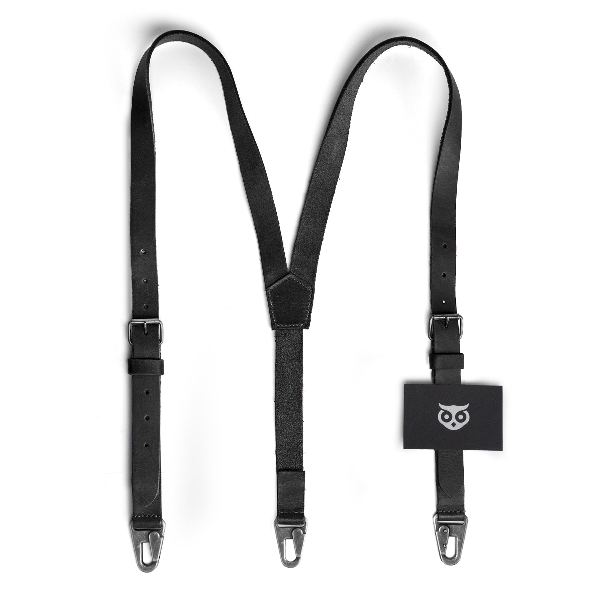 Hide & Drink Rustic Slim Suspenders in black leather against a white background, perfecting the X back style. A stylish and practical choice for wedding attire, hand cut and sewn by artisans in Guatemala.