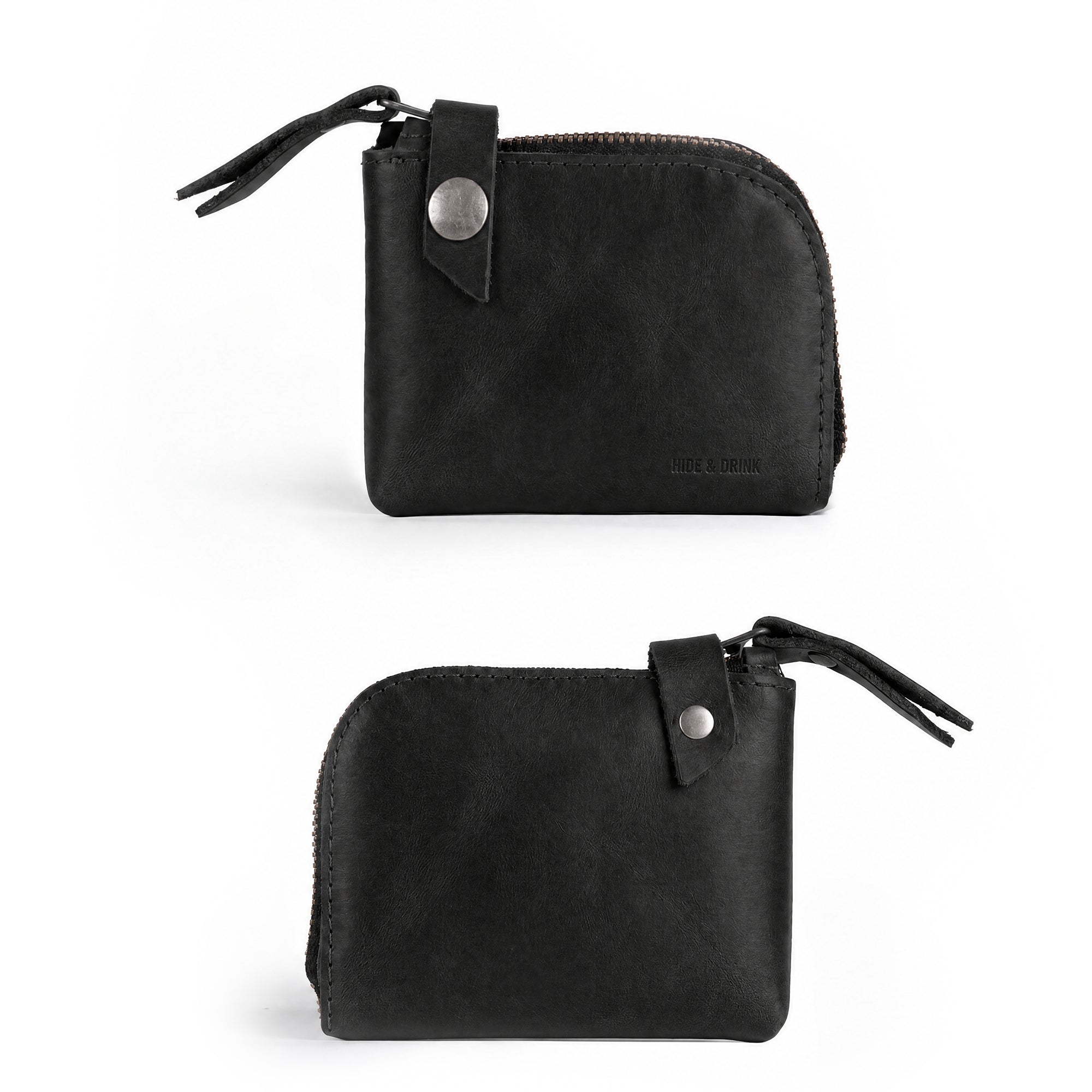 Side view of the black Lion's Mane Zippered Wallet by Hide & Drink, showcasing its elegant finish and artisan craftsmanship. A great choice for anyone in need of a practical cash holder.
