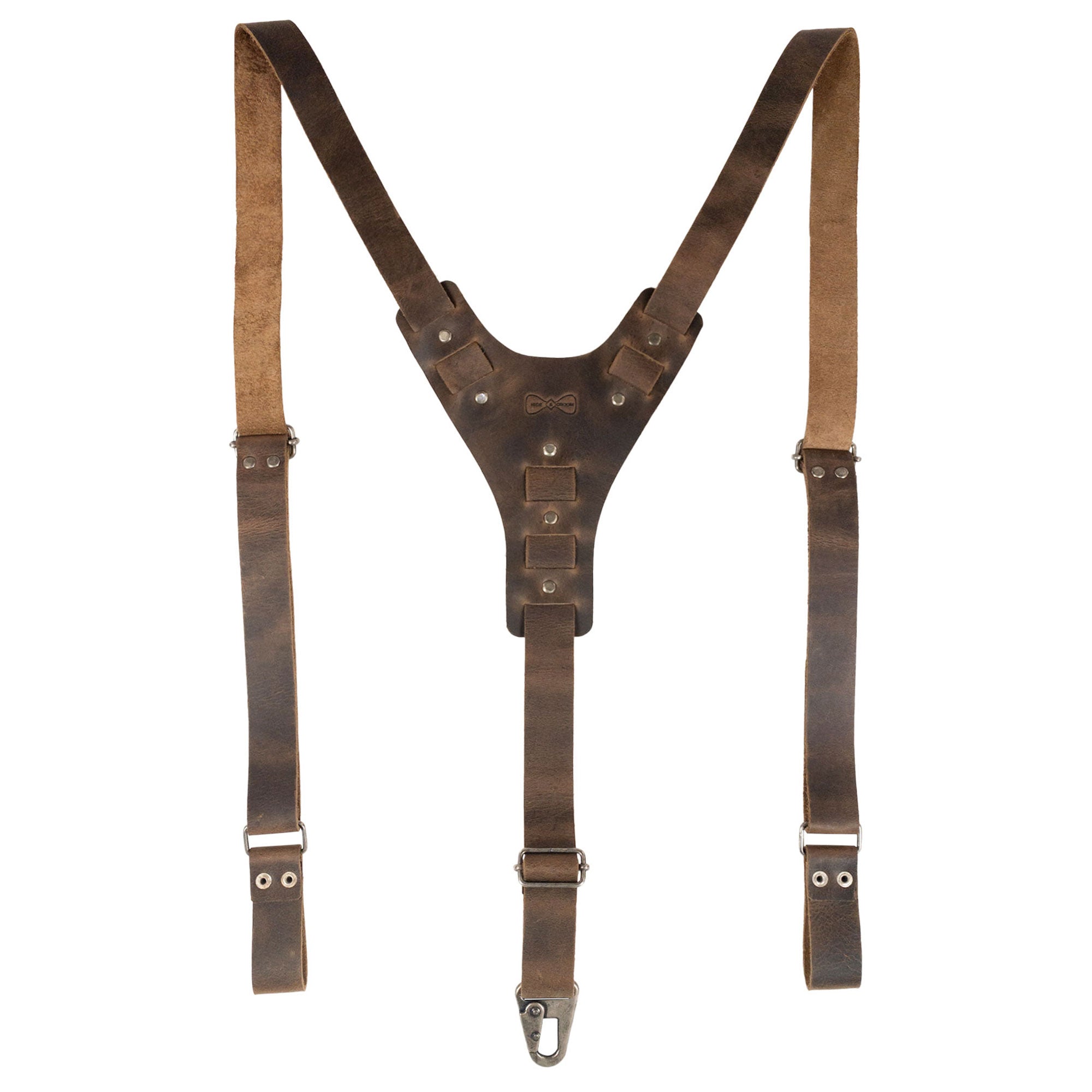Front view of Rustic Y Back Suspenders from Hide & Groom, showcasing their vintage aesthetic. Handmade from full grain leather, these suspenders are ideal for groomsmen, best men, and bachelors, perfect for wedding ceremonies and dinner parties with artisan craftsmanship.
