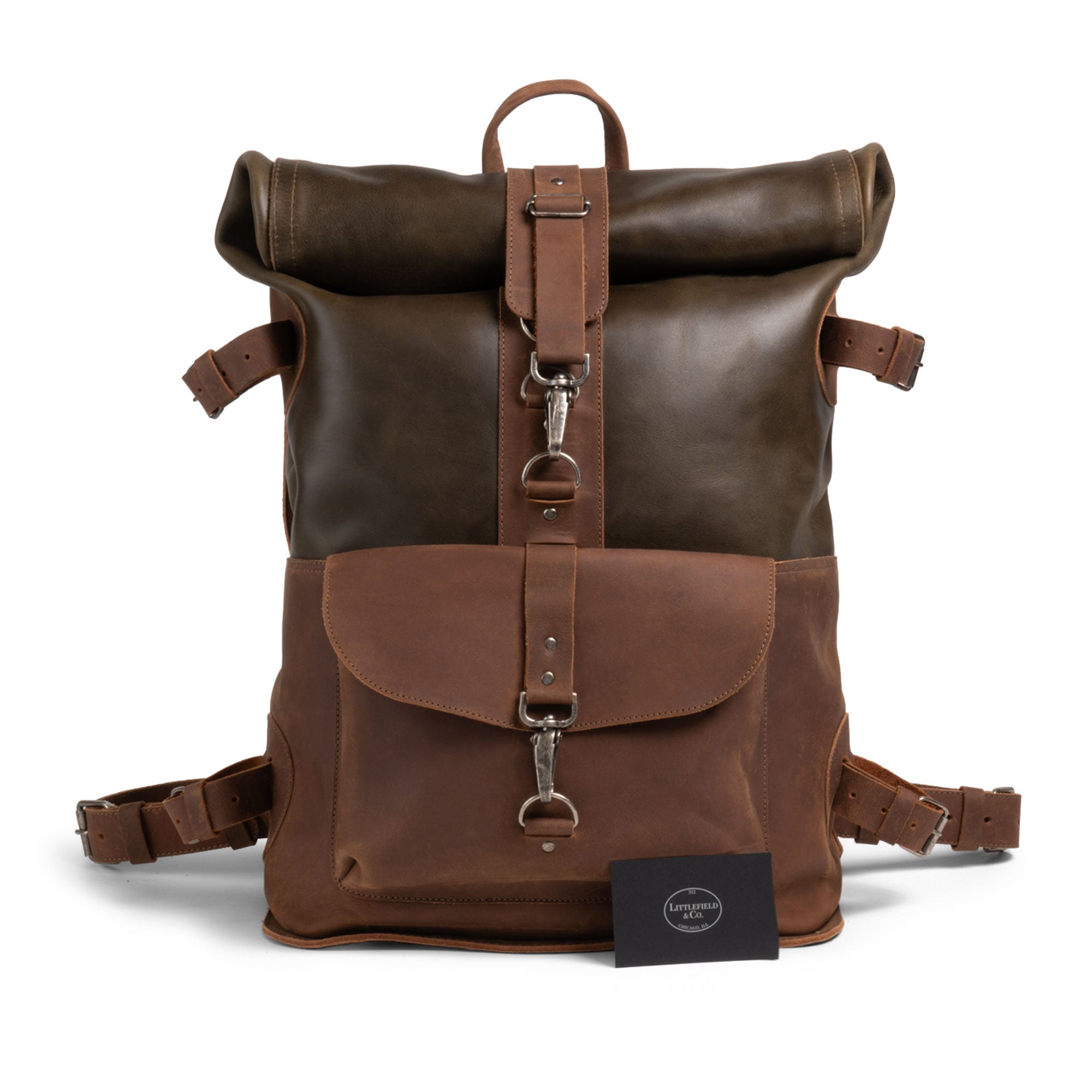 Showcasing the Vintage Adventure Backpack by Littlefield & Co., this image highlights its elegant design and superior craftsmanship. This classic rucksack, ideal as a vintage backpack for men and women, is perfect for travel as a carry-on. Crafted from full grain leather and handmade in La Antigua Guatemala, it represents the artistry of small batch production and artisan techniques.