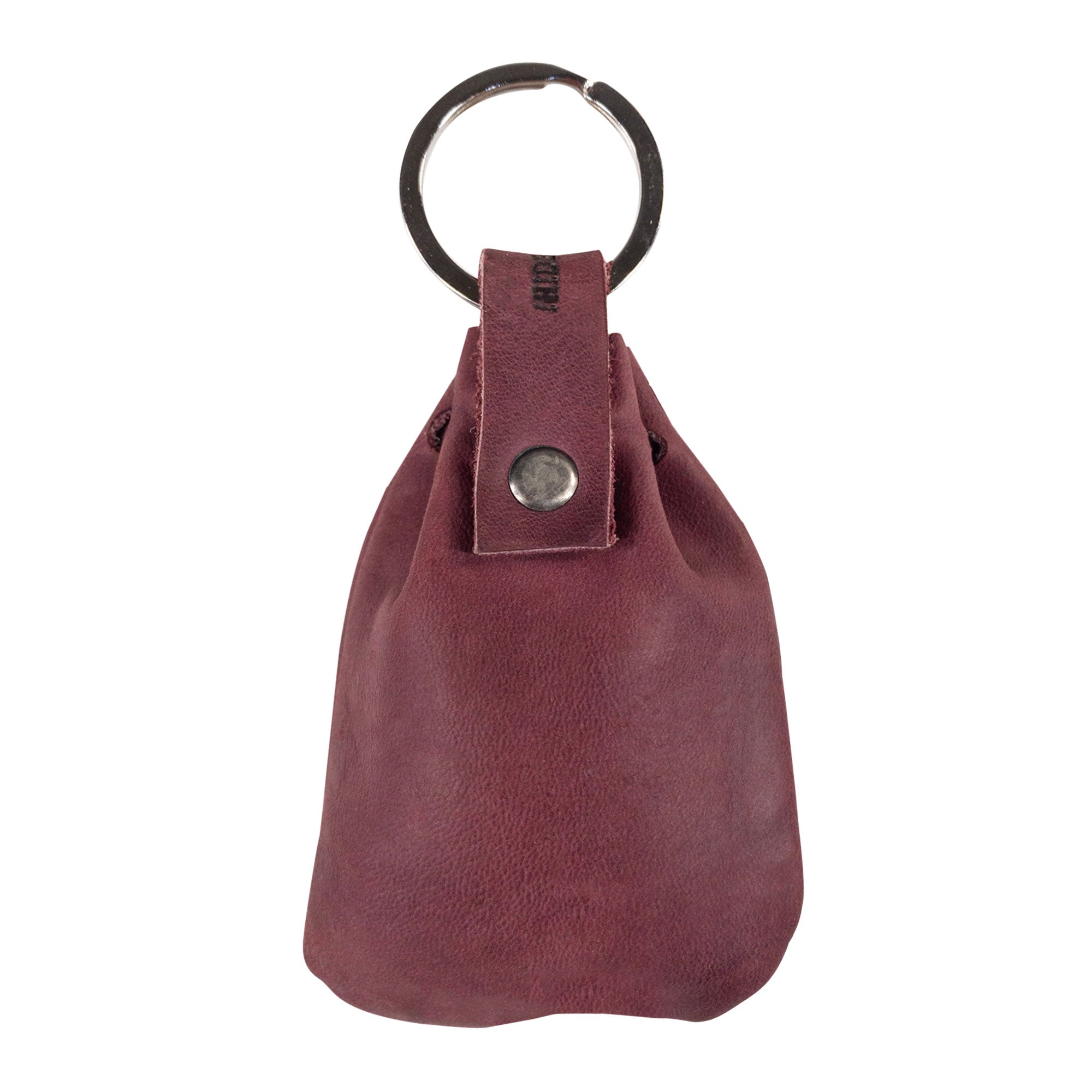 Stylishly crafted Mini Medieval Pouch Keychain by Hide & Drink in deep gray leather. This tiny bag with keyring efficiently functions as a coin organizer while showcasing the artisan craftsmanship from La Antigua Guatemala.