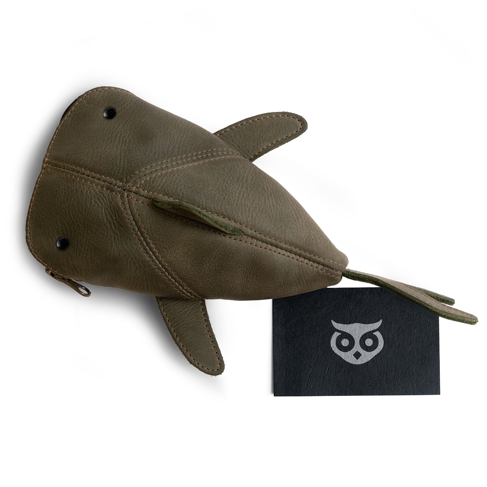 Image of the green Leather Shark Pouch by Hide & Drink, displaying its zippered functionality. This unique shark shaped case is perfect for holding various small items and serves well as a pencil purse or cable holder. Made from full grain leather, it represents small batch artisan craftsmanship from La Antigua Guatemala & Oaxaca Mexico.